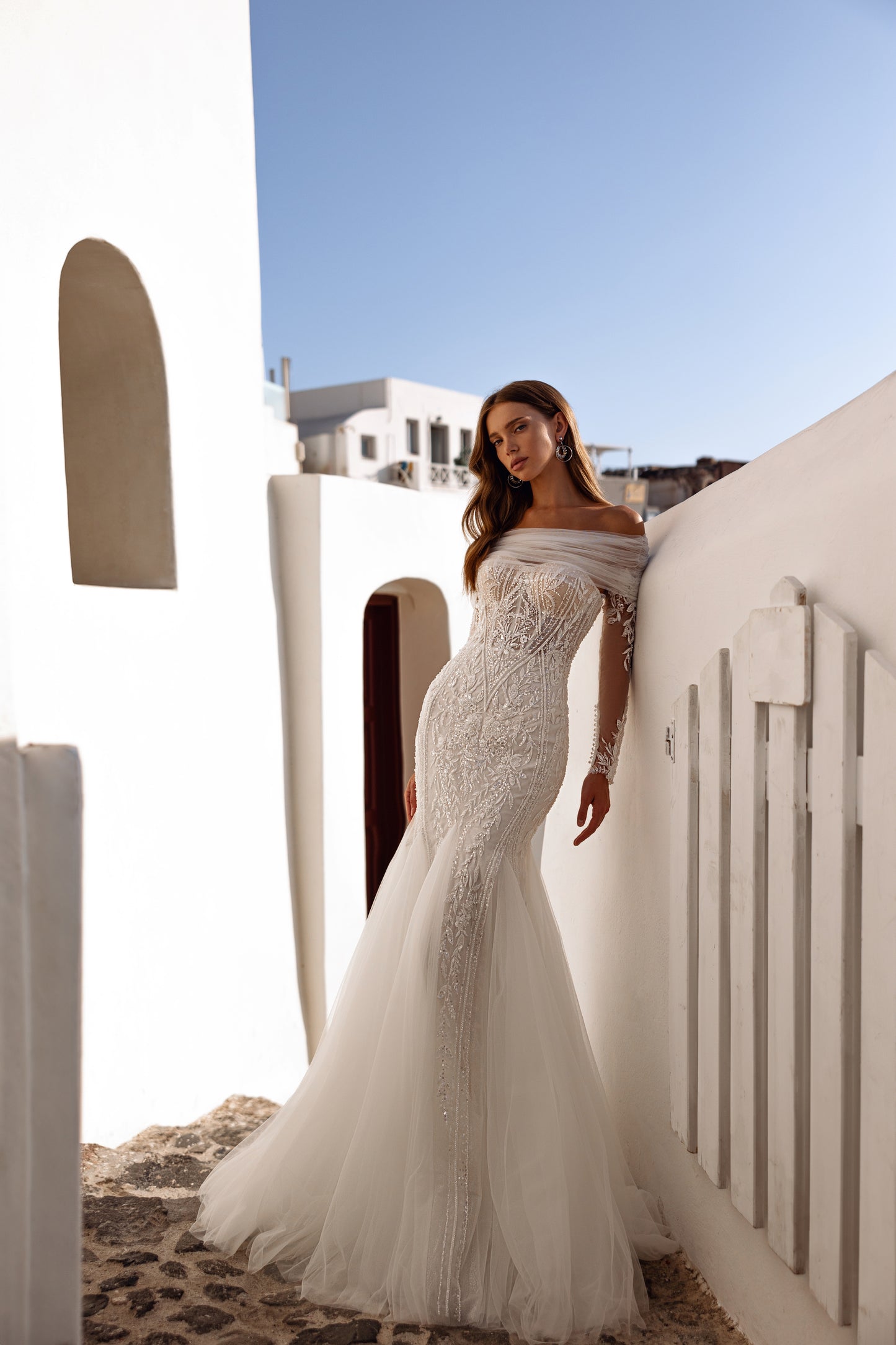 Mermaid wedding dress with sweetheart neckline and removable bolero