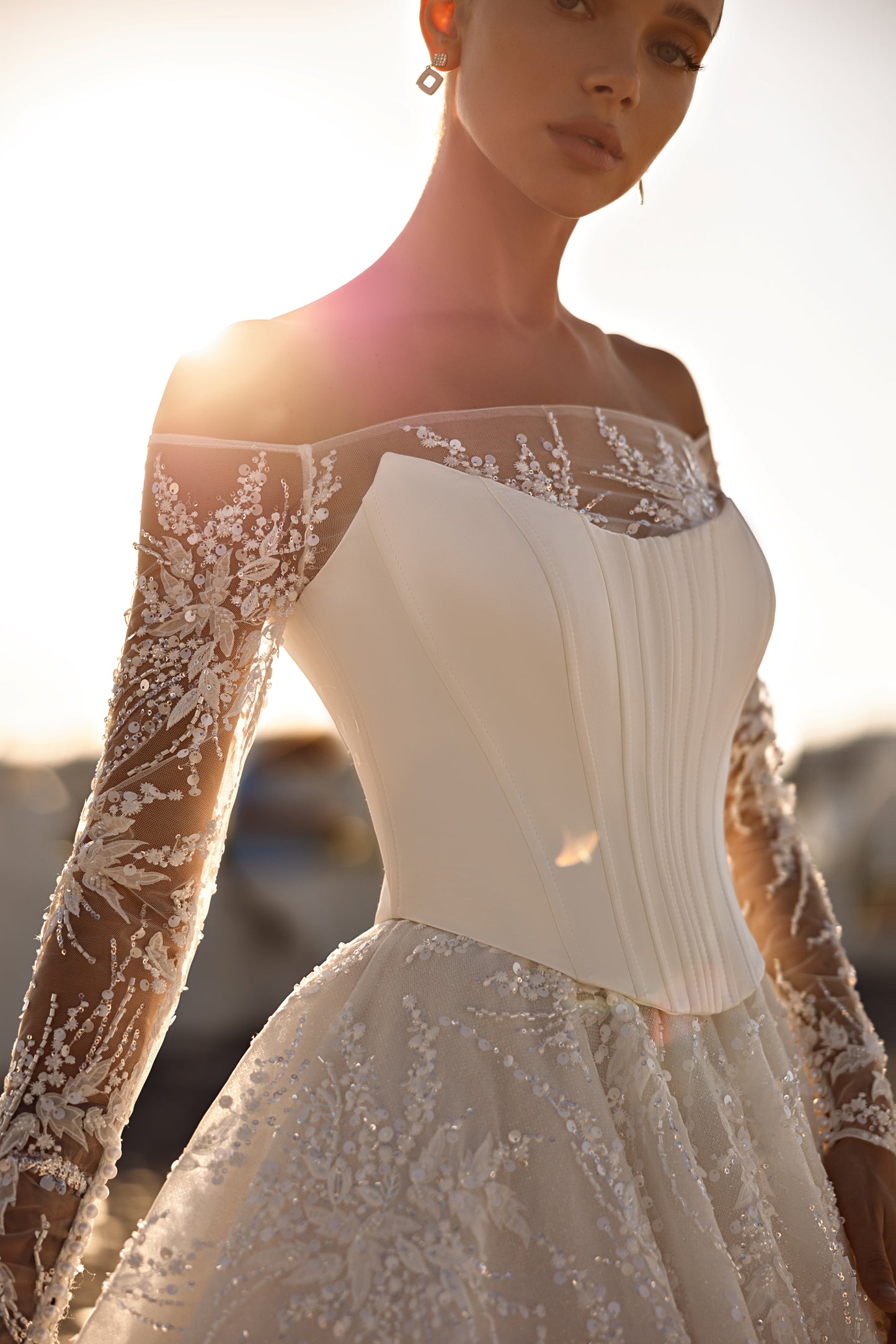 Princess A-line wedding dress with illusion sleeves and cathedral train