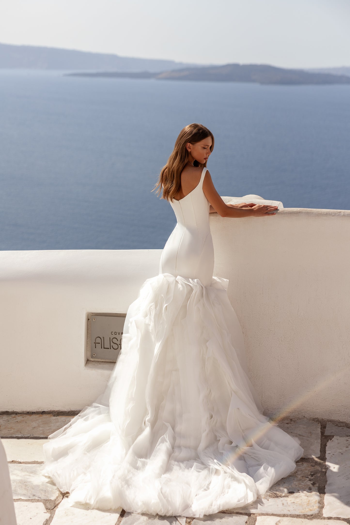Mermaid wedding dress with ruffles and fishtail train