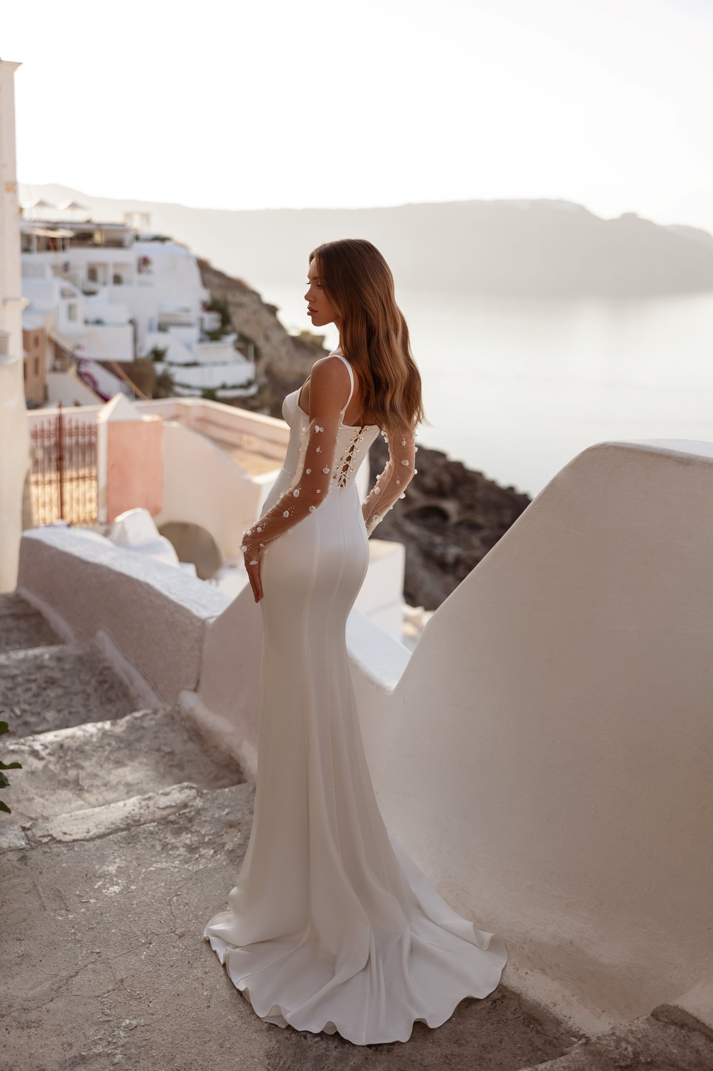 Mermaid wedding dress with detachable train and lace-up back
