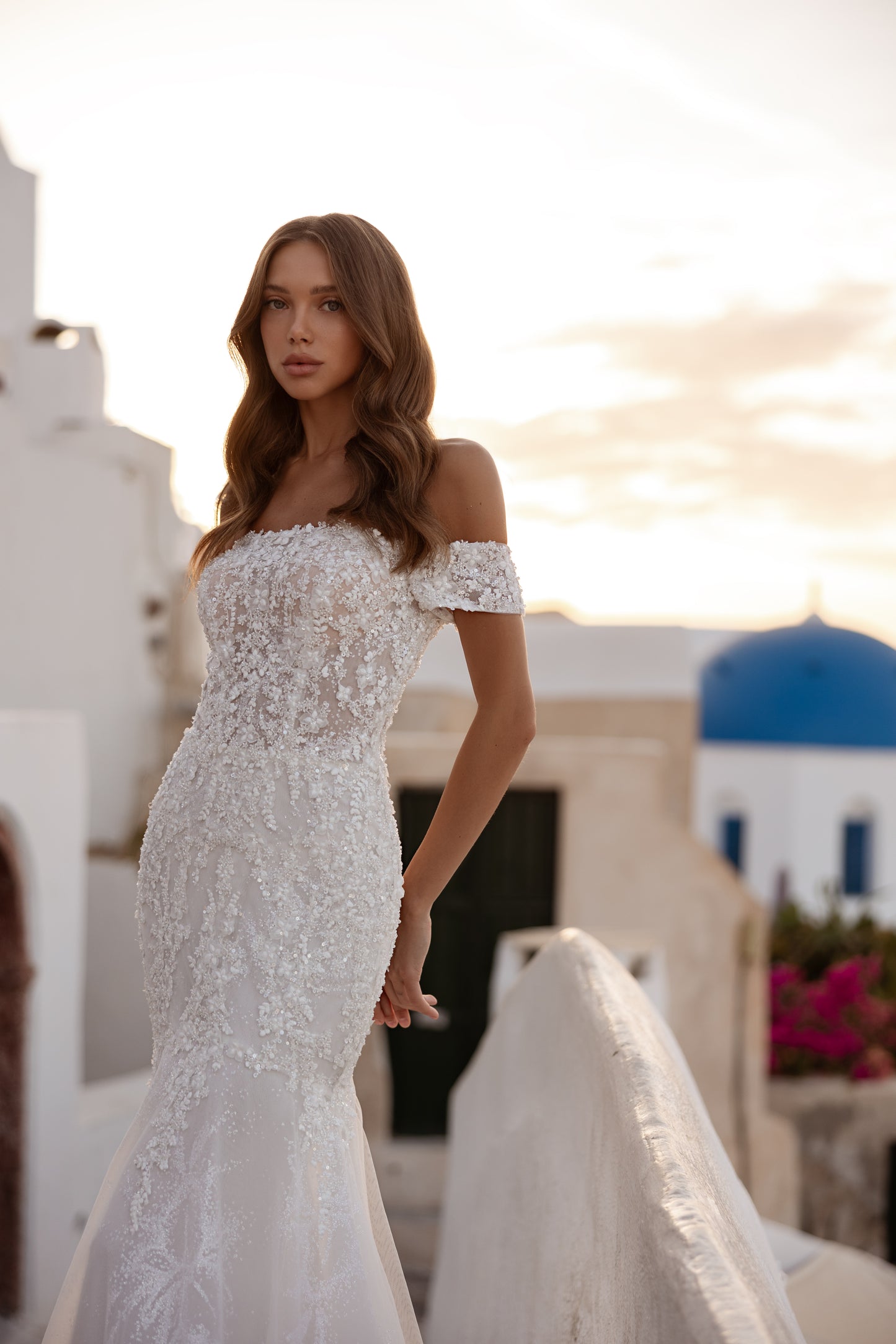 Mermaid fit-and-flare wedding dress with fishtail train