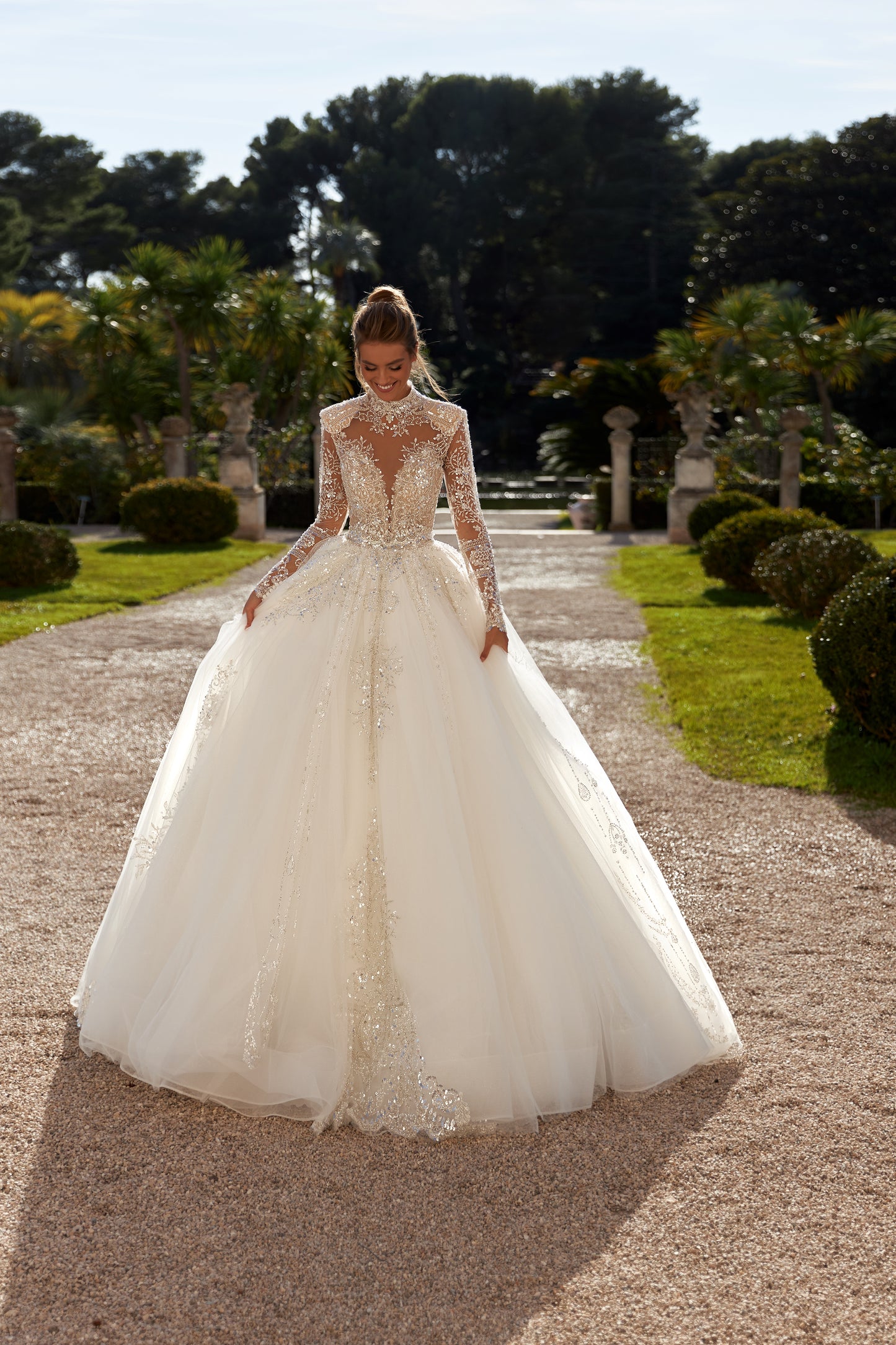 Princess ball gown wedding dress with beaded cathedral train