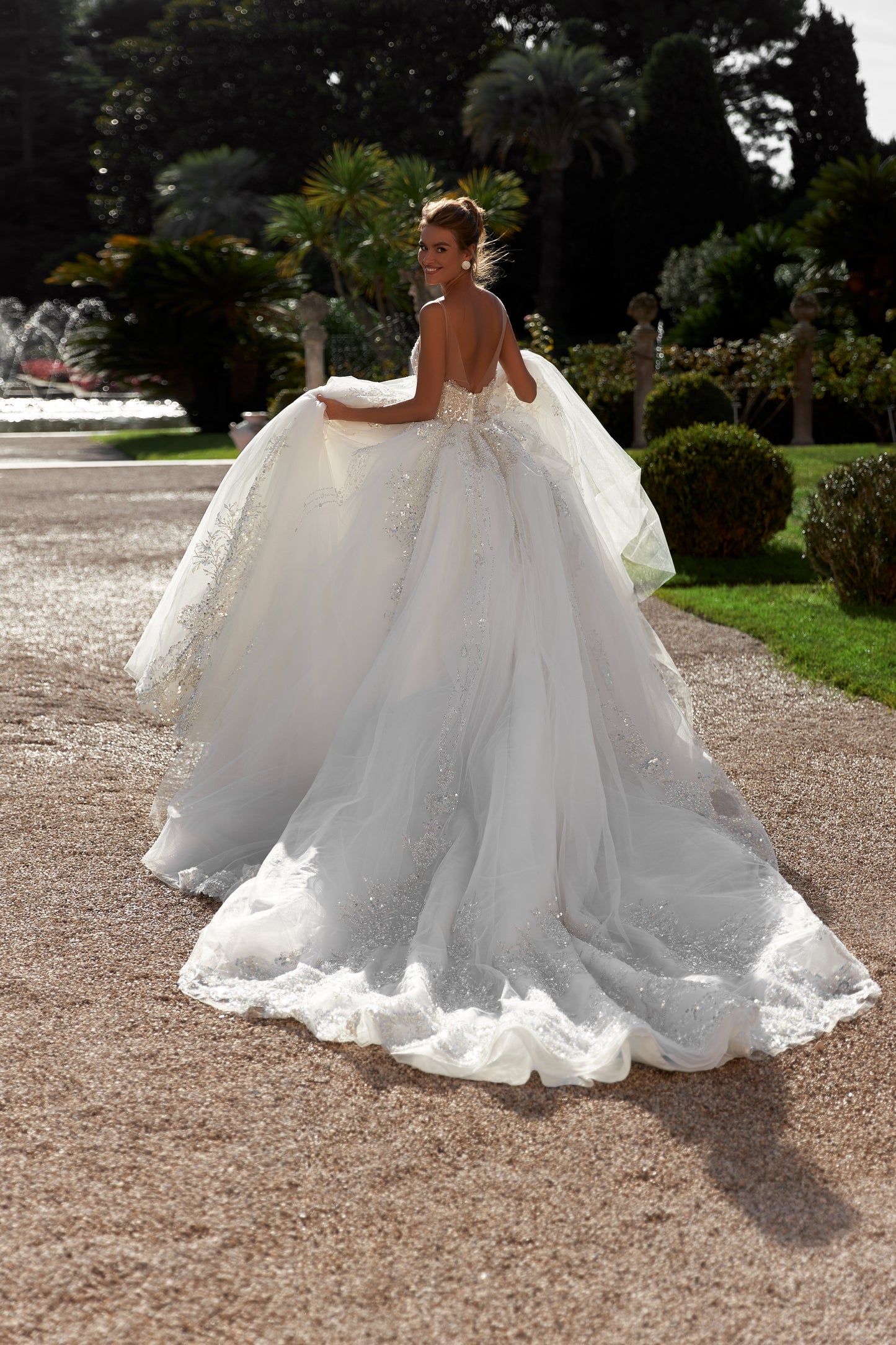 Princess ball gown wedding dress with beaded cathedral train