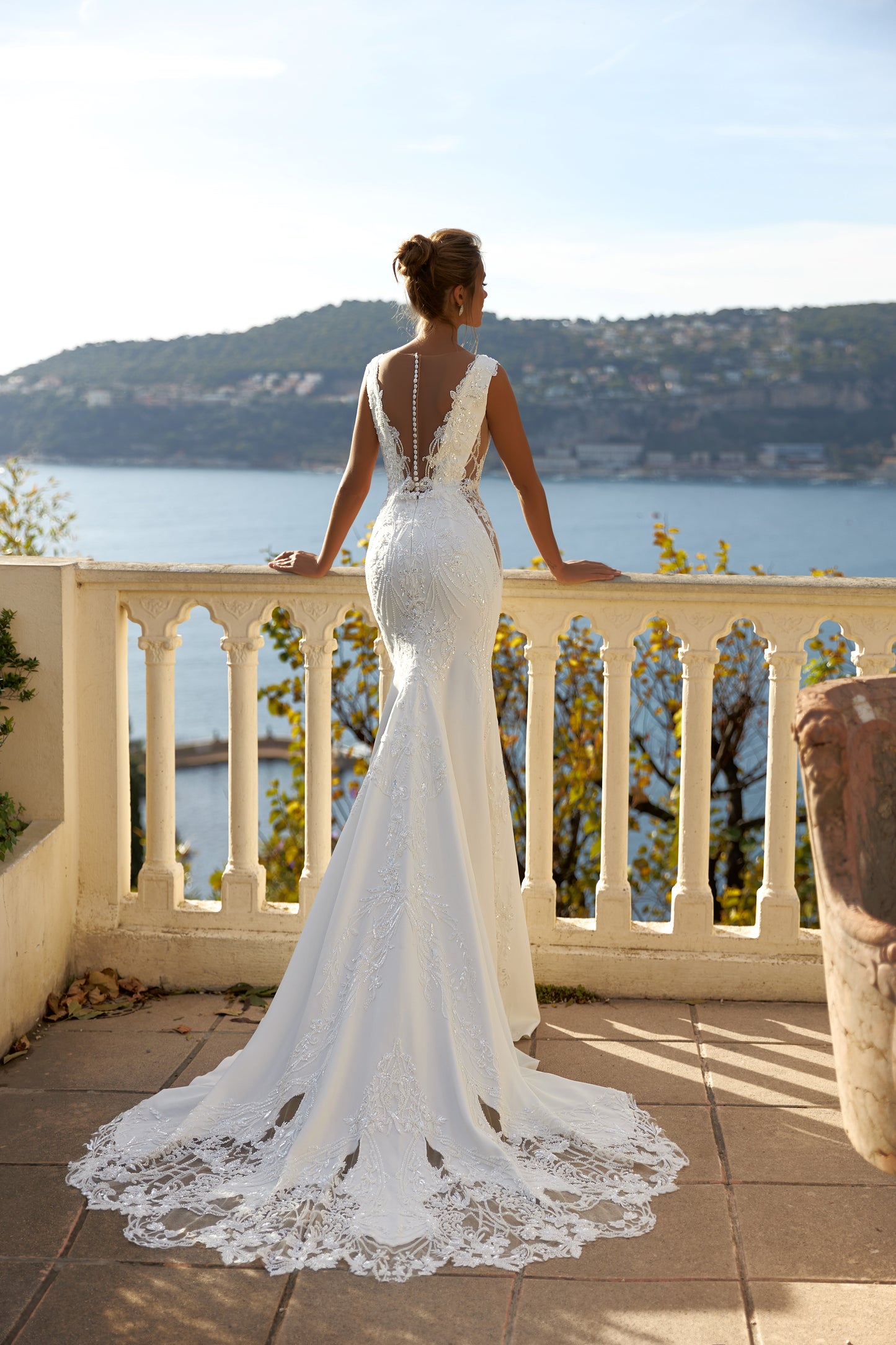 Mermaid lace satin wedding dress with deep V neckline.