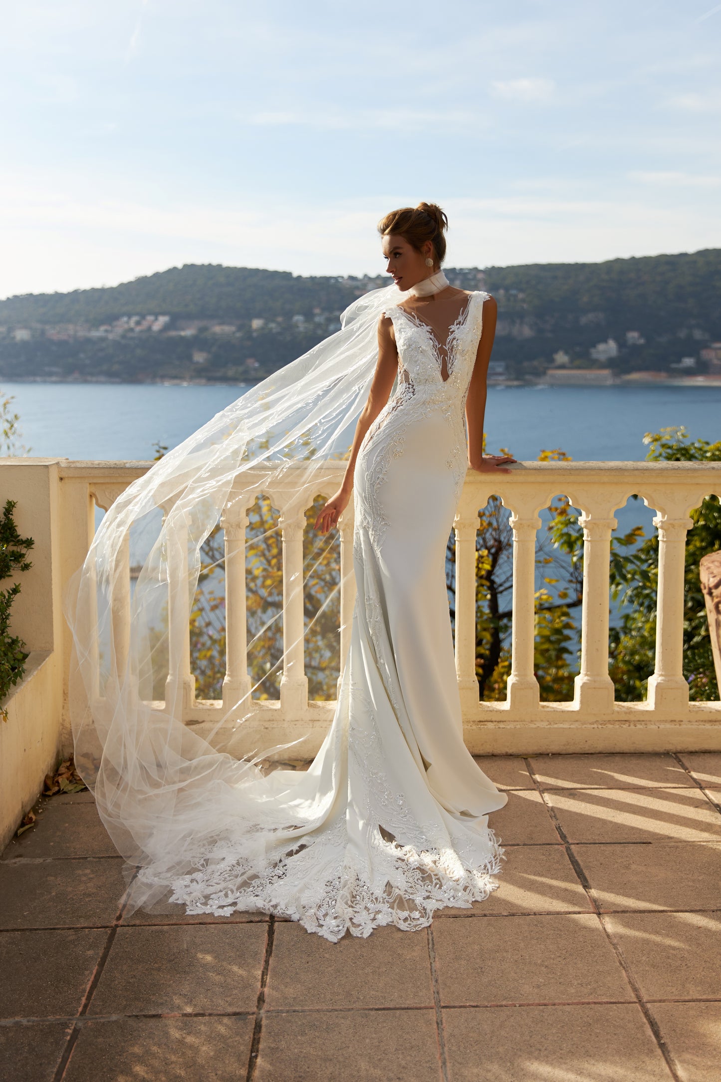 Mermaid lace satin wedding dress with deep V neckline.