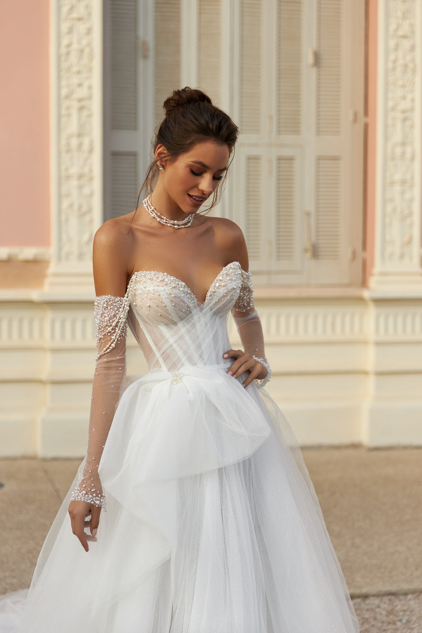 A-line wedding dress with pearl straps & glitter tulle train