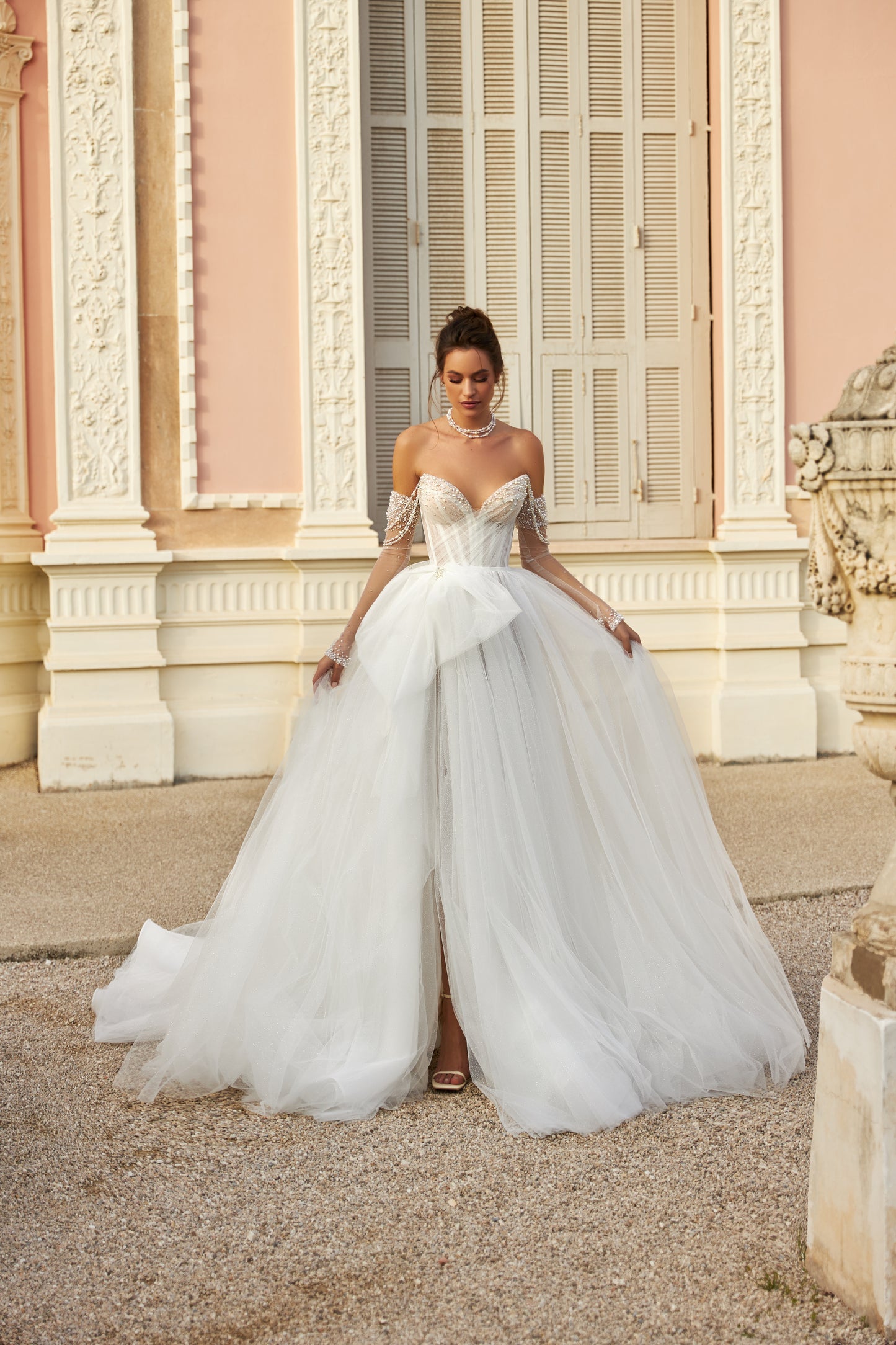 A-line wedding dress with pearl straps & glitter tulle train