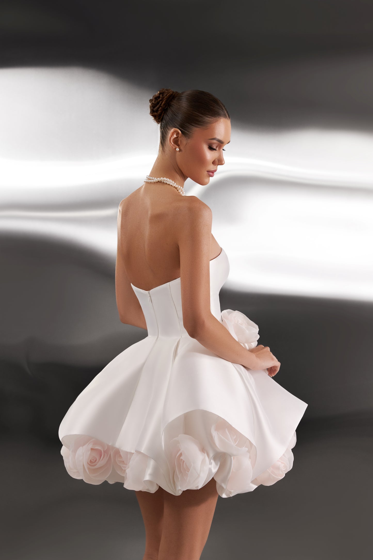 A-line sleeveless wedding dress with 3D floral details