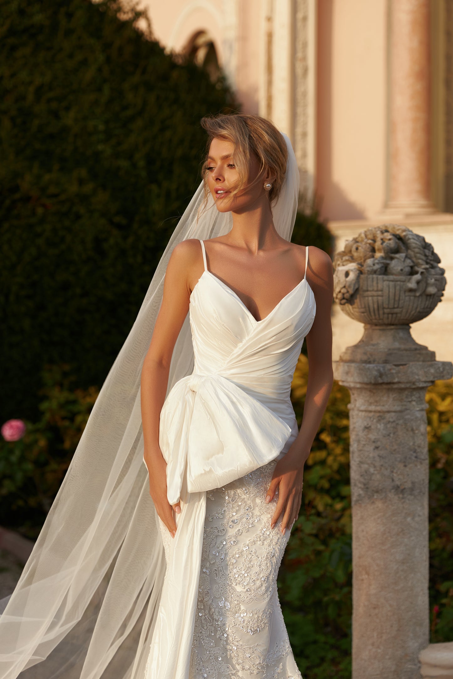 Fitted wedding dress with V-neckline, spaghetti straps, satin