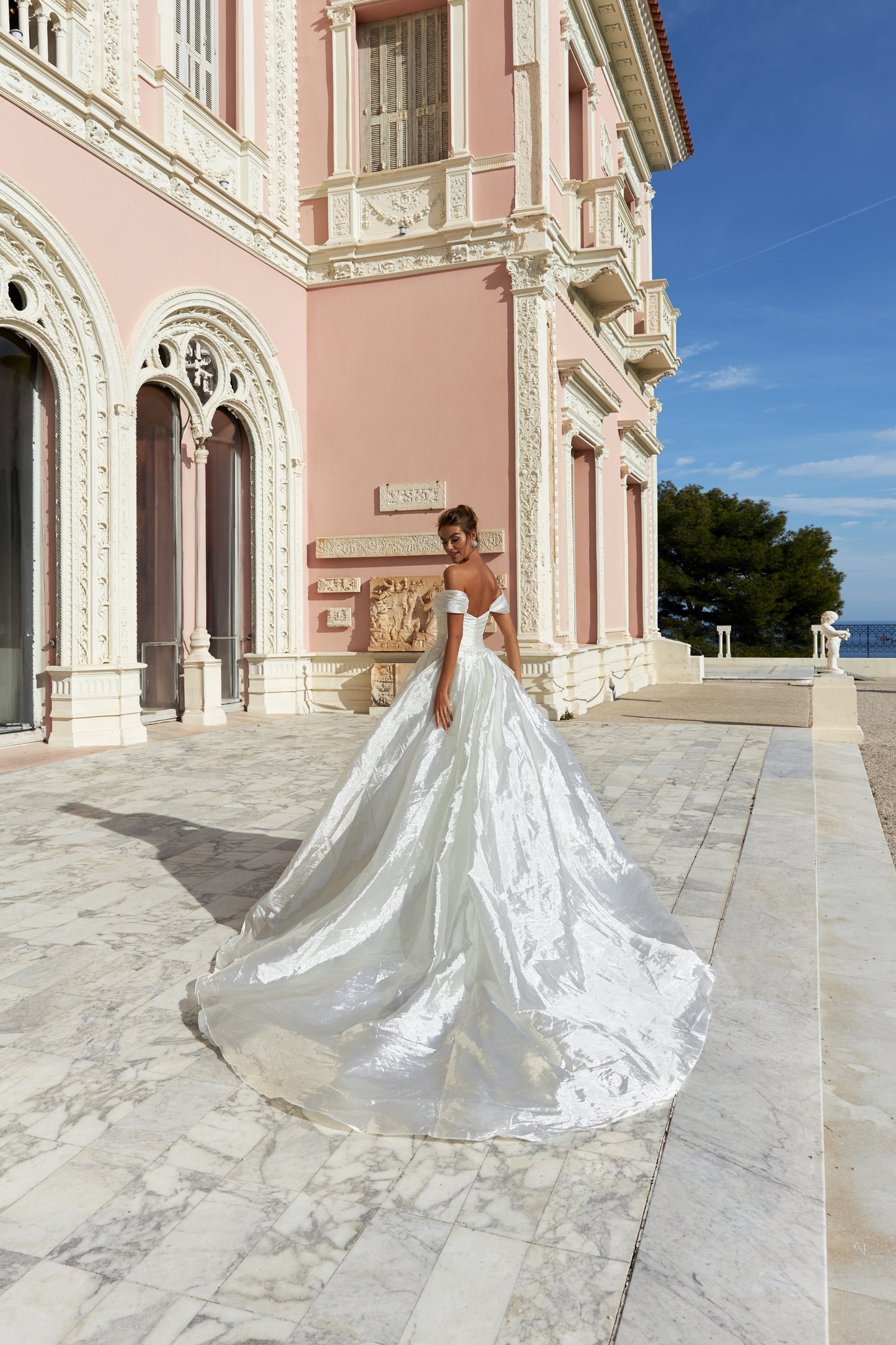 A-line silk wedding dress with off-the-shoulder sleeves