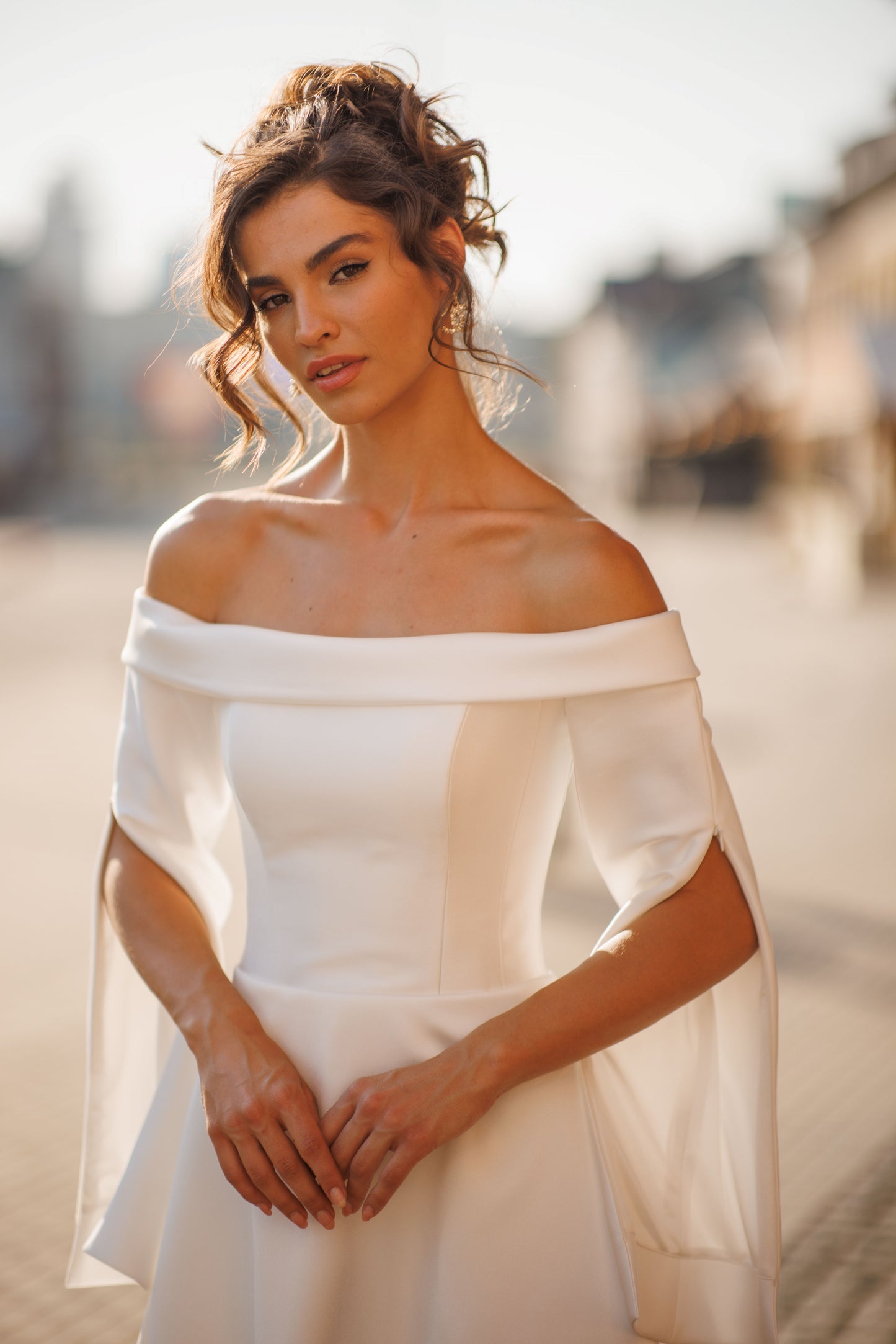 Minimalist A-line off-the-shoulder Mikado wedding dress.