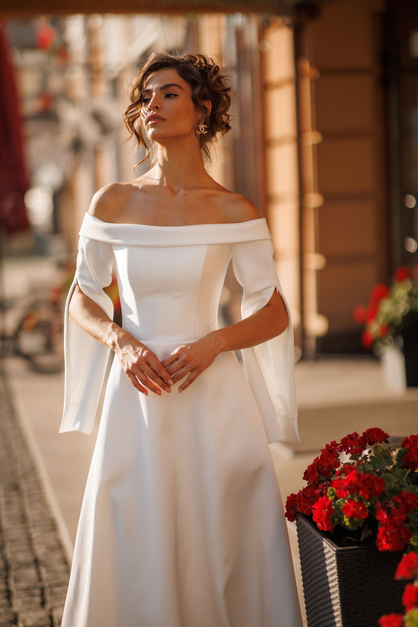 Minimalist A-line off-the-shoulder Mikado wedding dress.