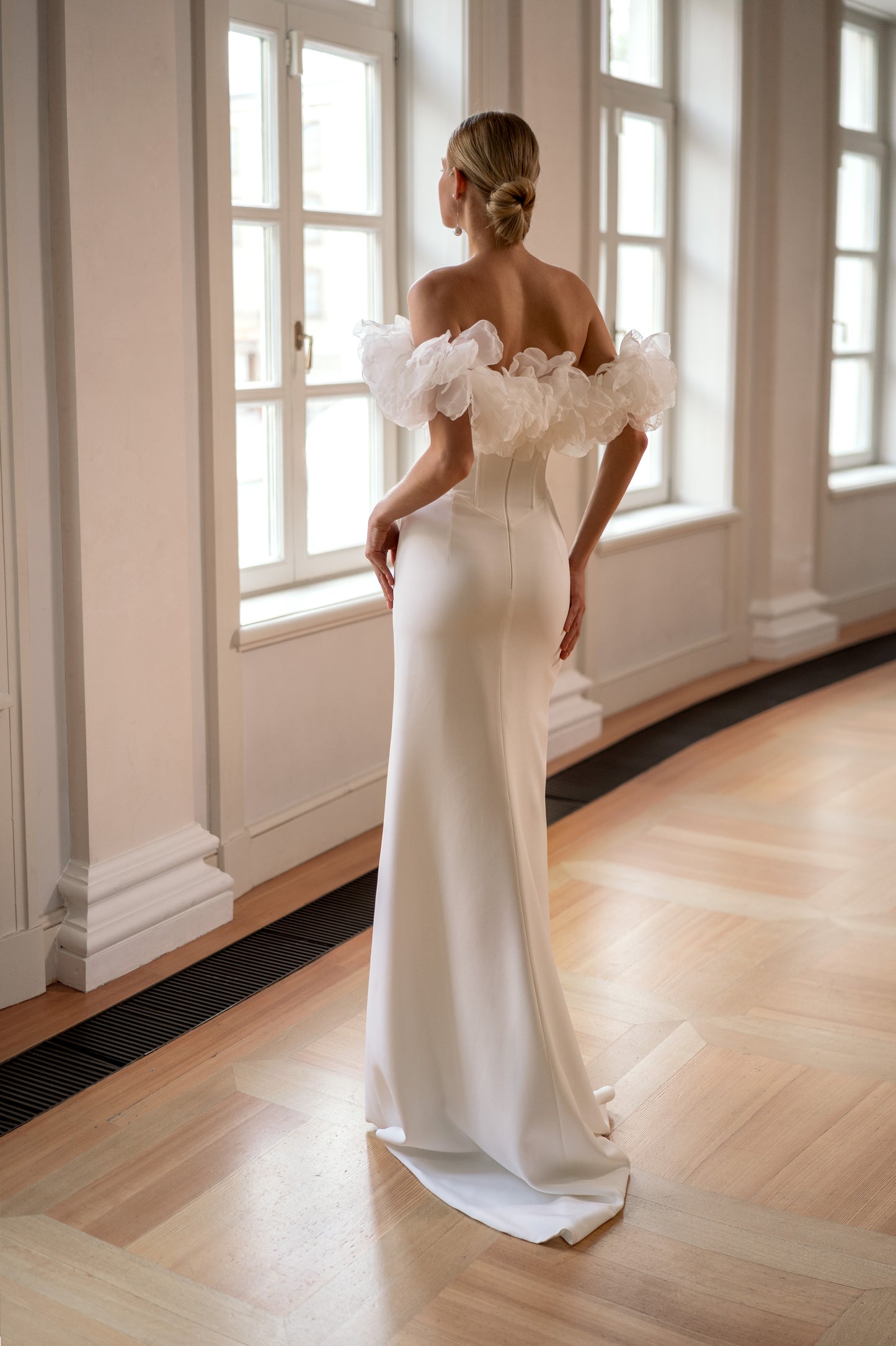 Mermaid wedding dress with boat neckline and sweep train