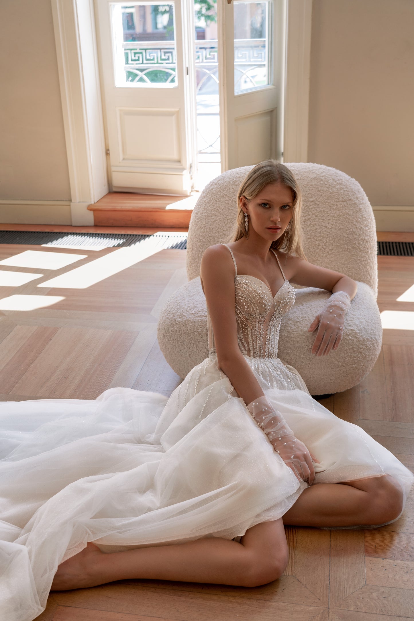 Romantic A-line sleeveless wedding dress with pearl gloves