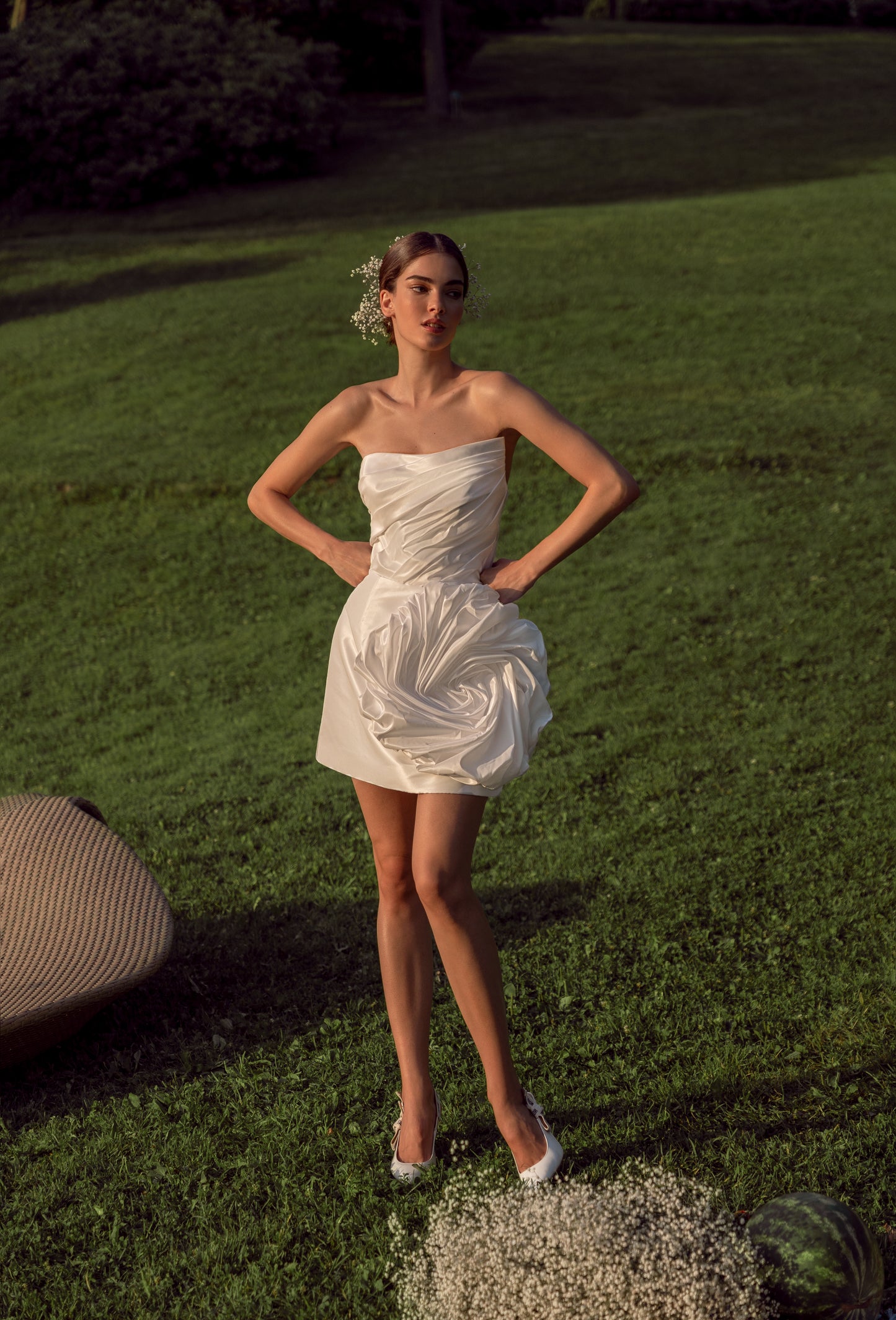 Minimalist sleeveless mini wedding dress with detachable train