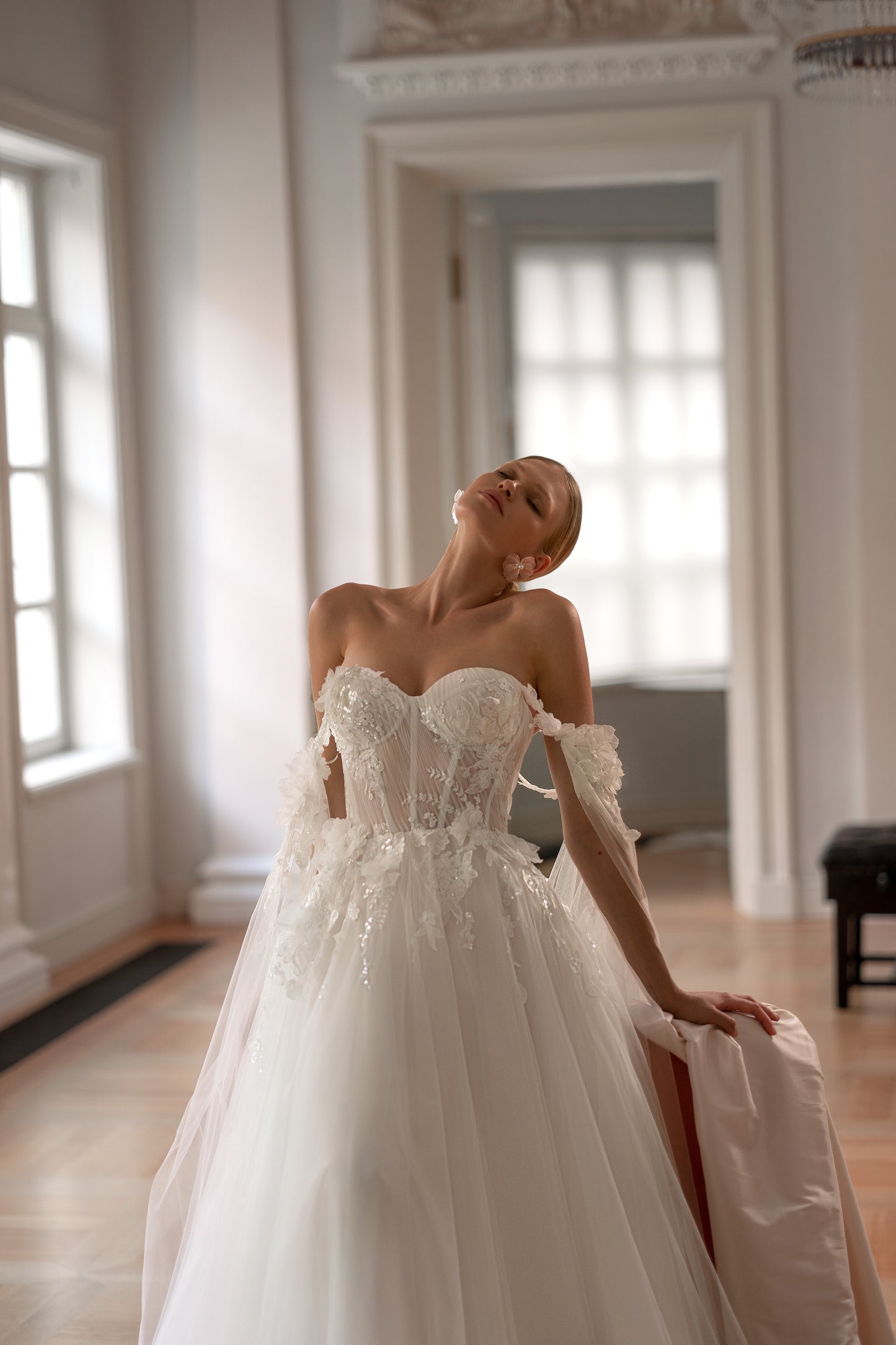 Sweetheart neckline open back tulle wedding dress with wings