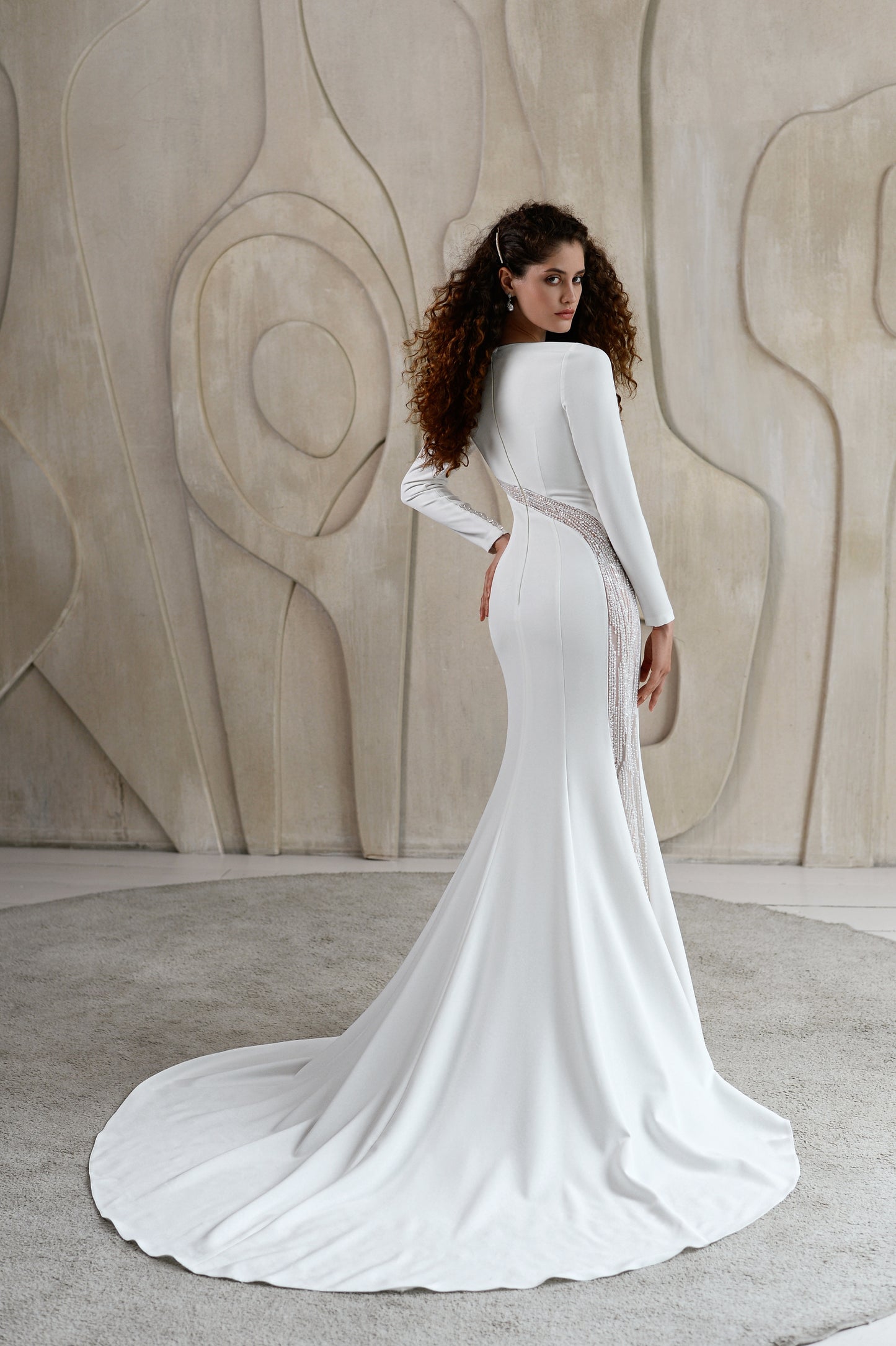 Simple sheath wedding dress with long sleeves & sweep train.