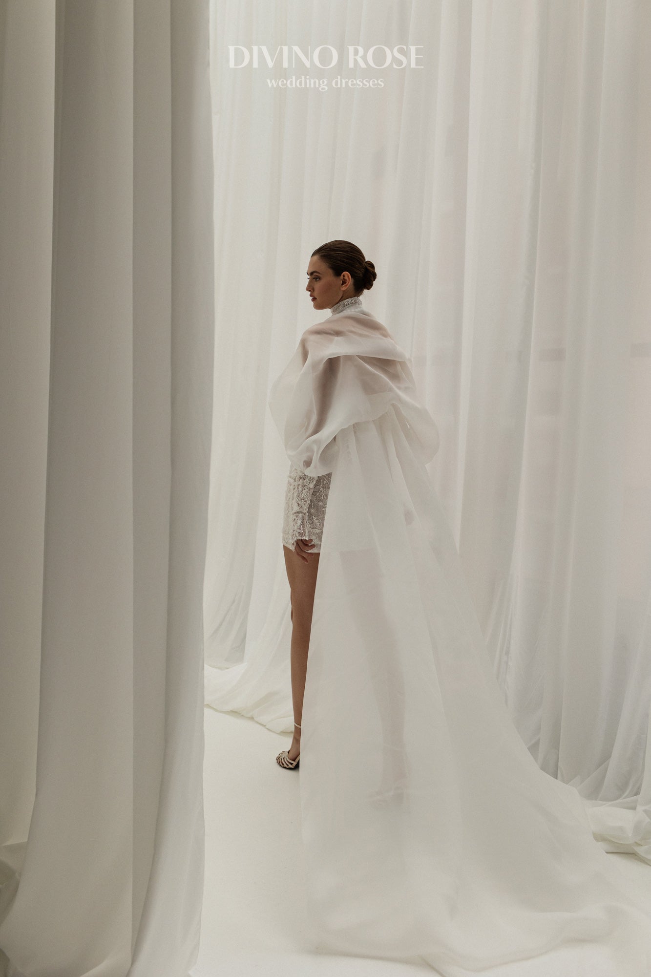 Mini wedding dress with lace and Watteau train