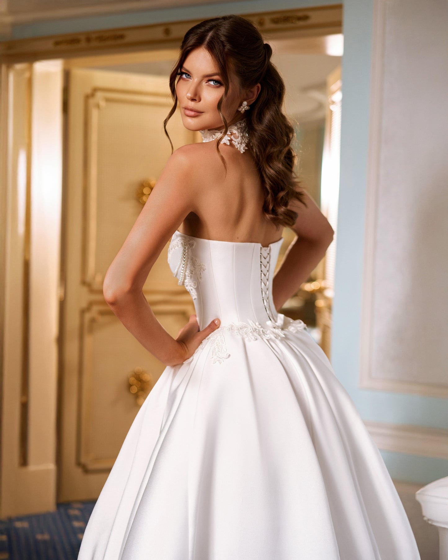Strapless Mikado princess A-line wedding dress with sweetheart neckline, lace and pearl choker, lace-up closure, and chapel train.