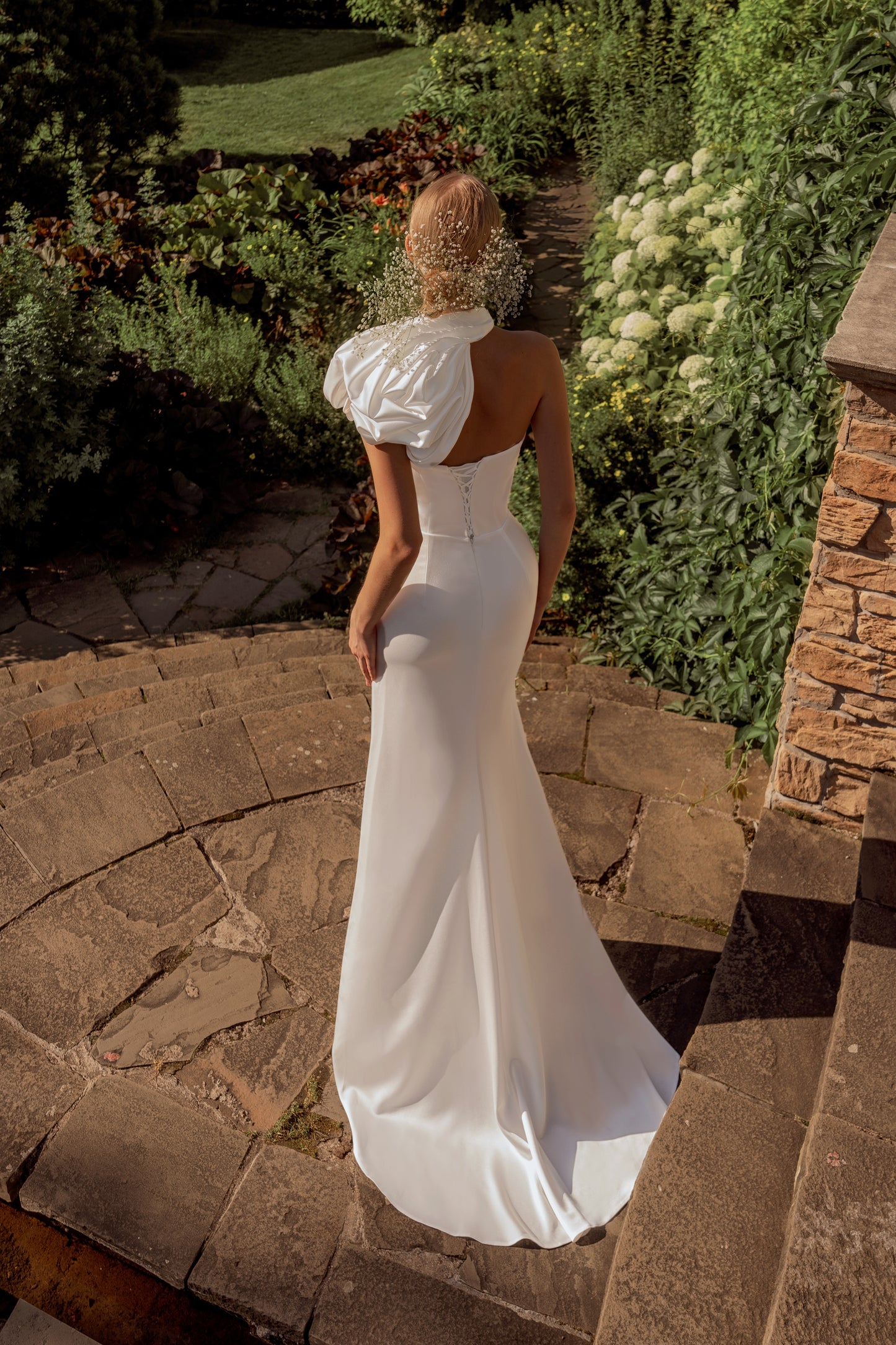 Minimalist sheath wedding dress with sweep train & side slit