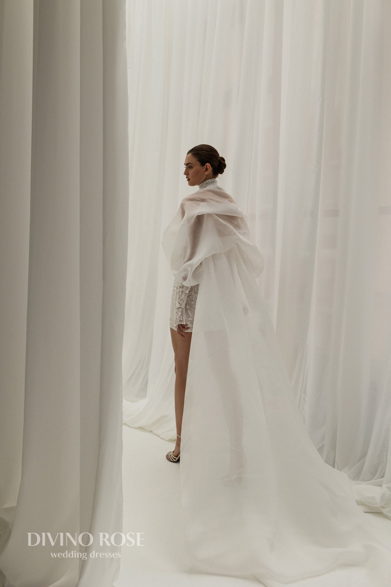 Mini wedding dress with lace and Watteau train