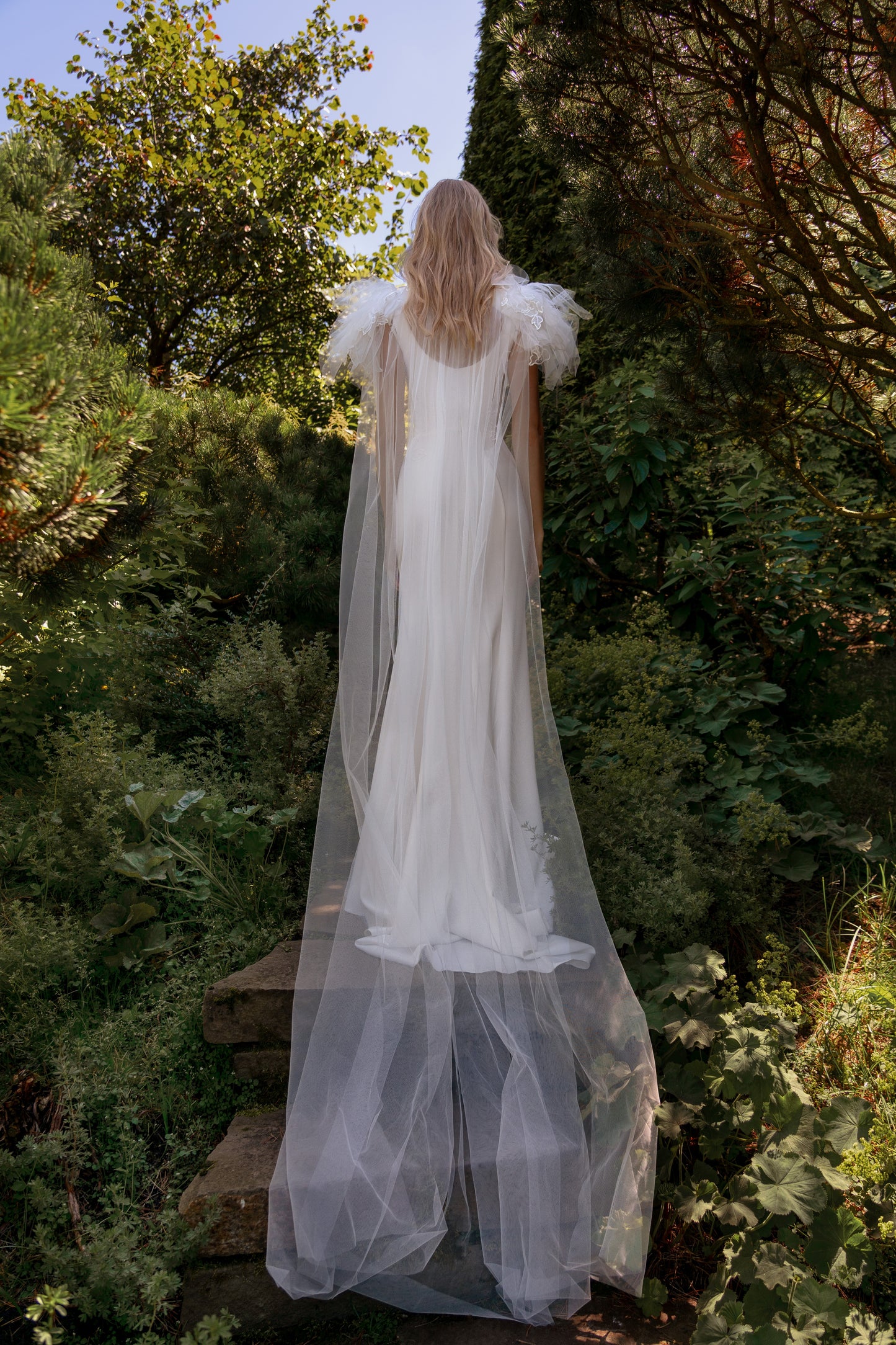 Sheath simple wedding dress with scoop neckline & open back.