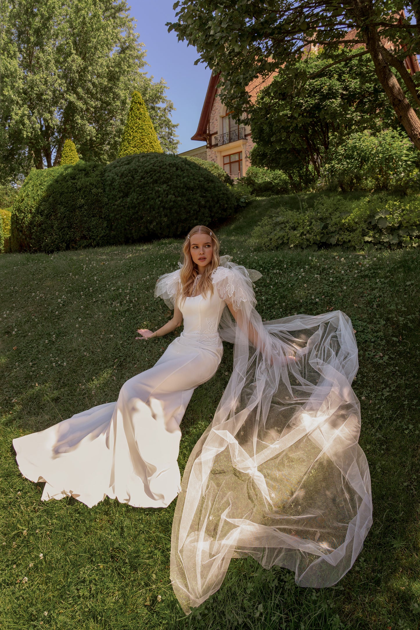Sheath simple wedding dress with scoop neckline & open back.