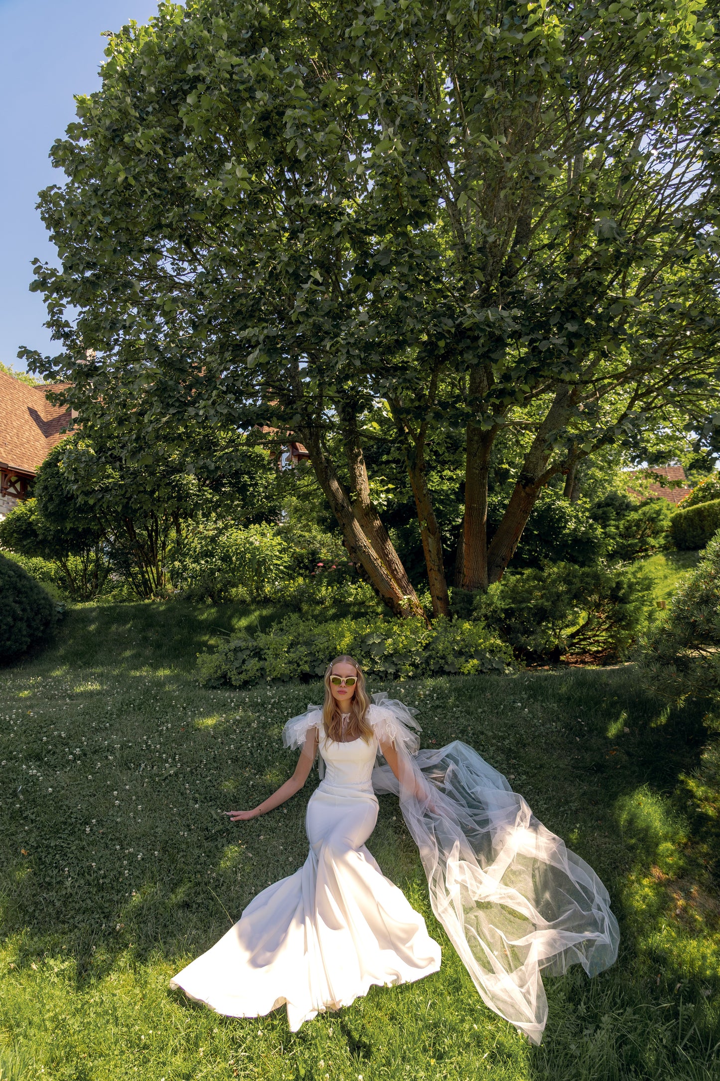 Sheath simple wedding dress with scoop neckline & open back.