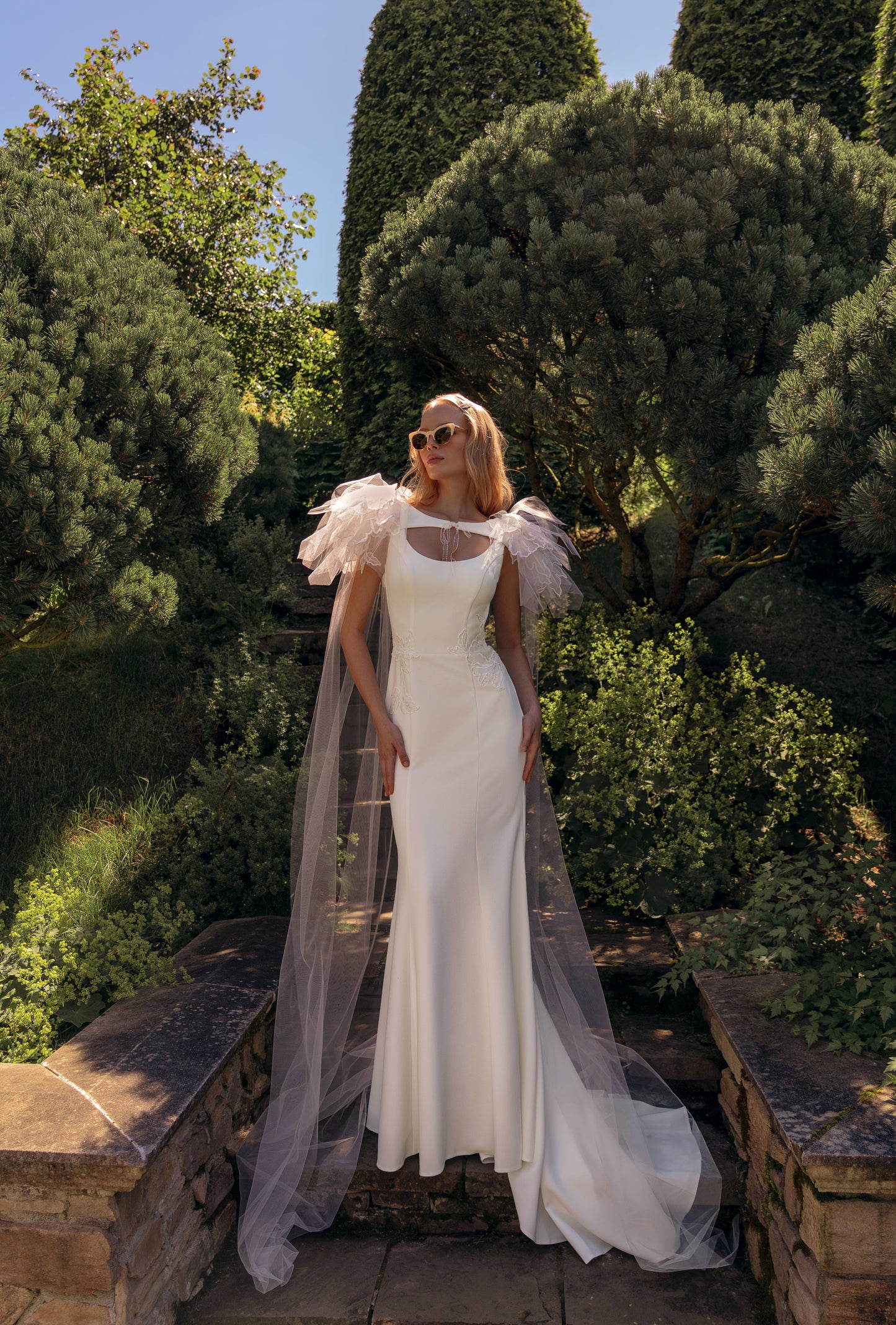 Sheath simple wedding dress with scoop neckline & open back.