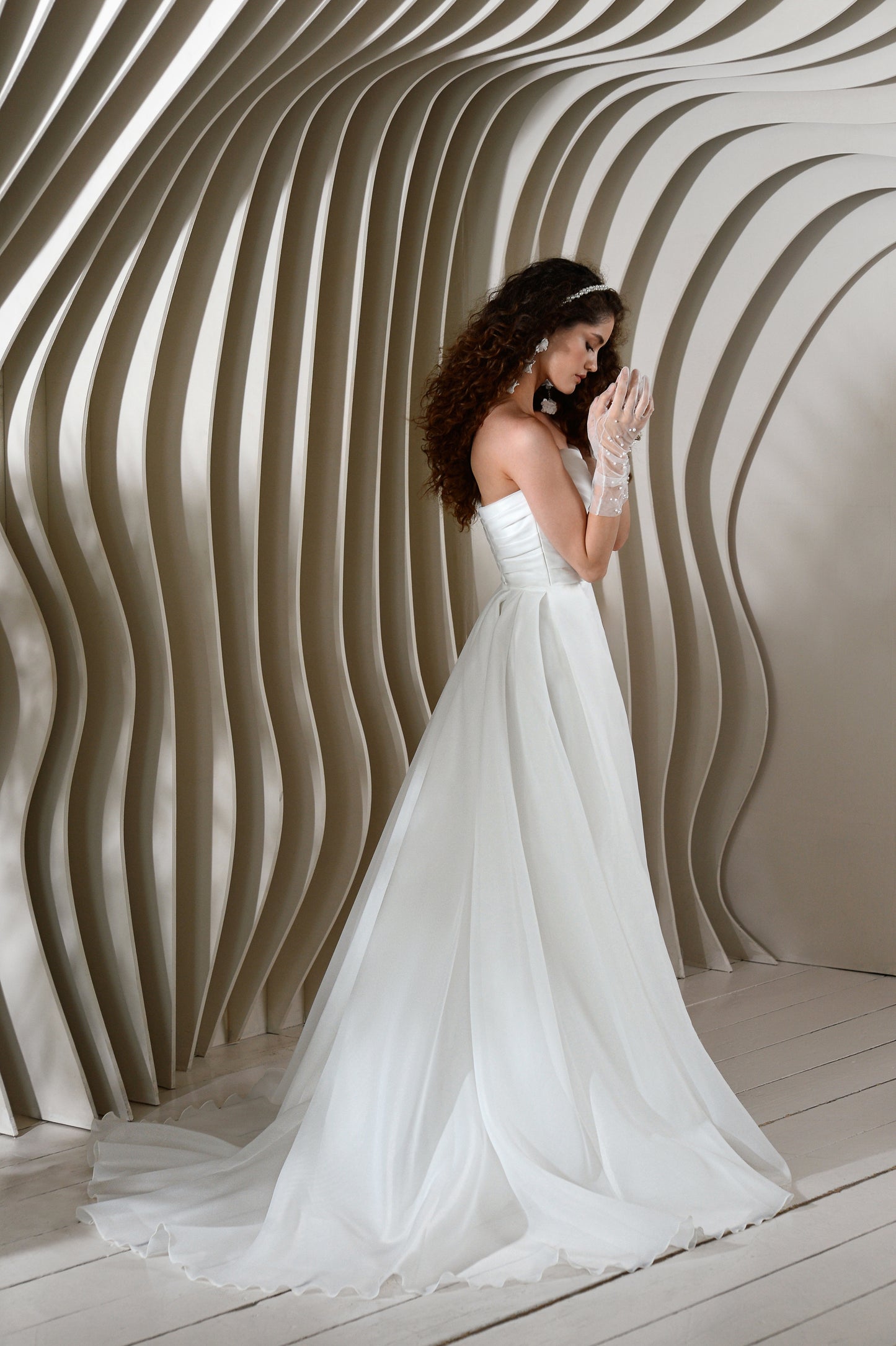Sweetheart sheath wedding dress with detachable train.