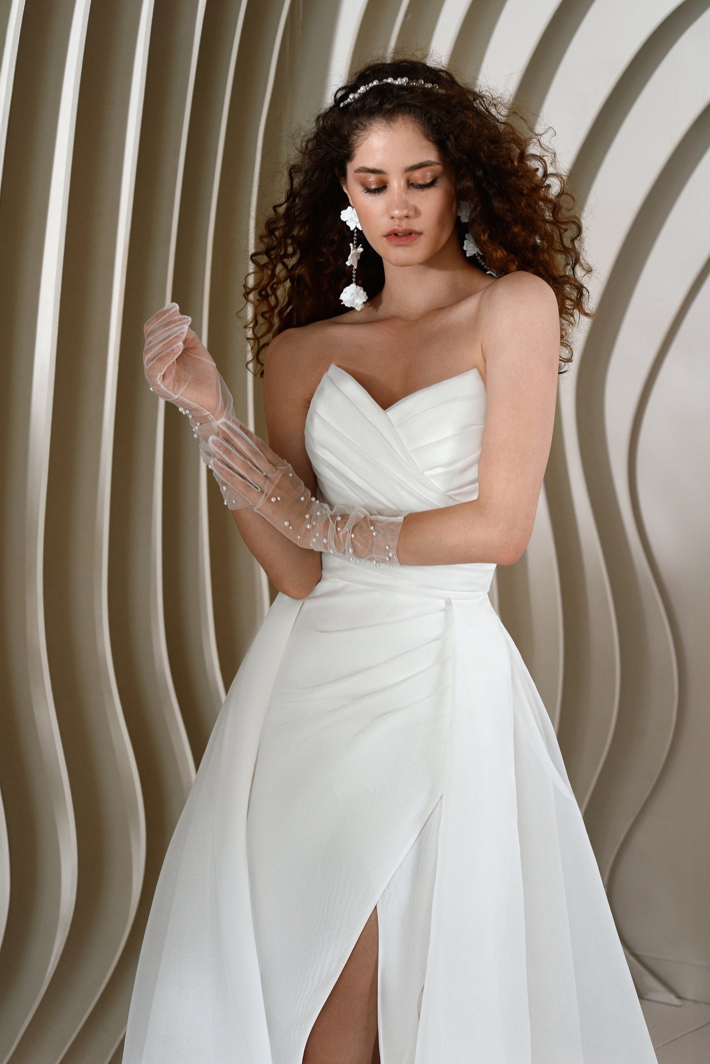 Sweetheart sheath wedding dress with detachable train.