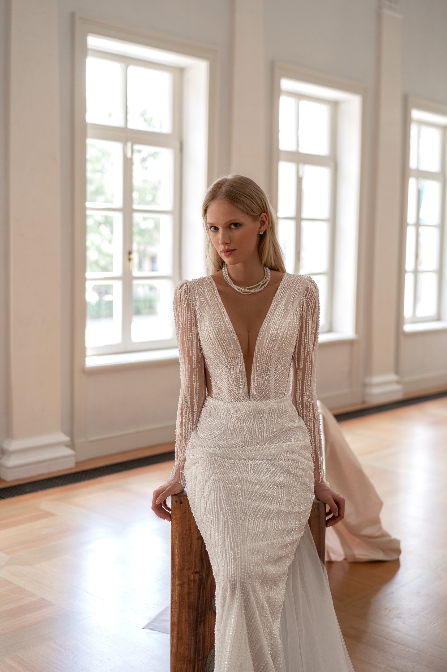 Sequin lace wedding dress with long sleeves and sweep train
