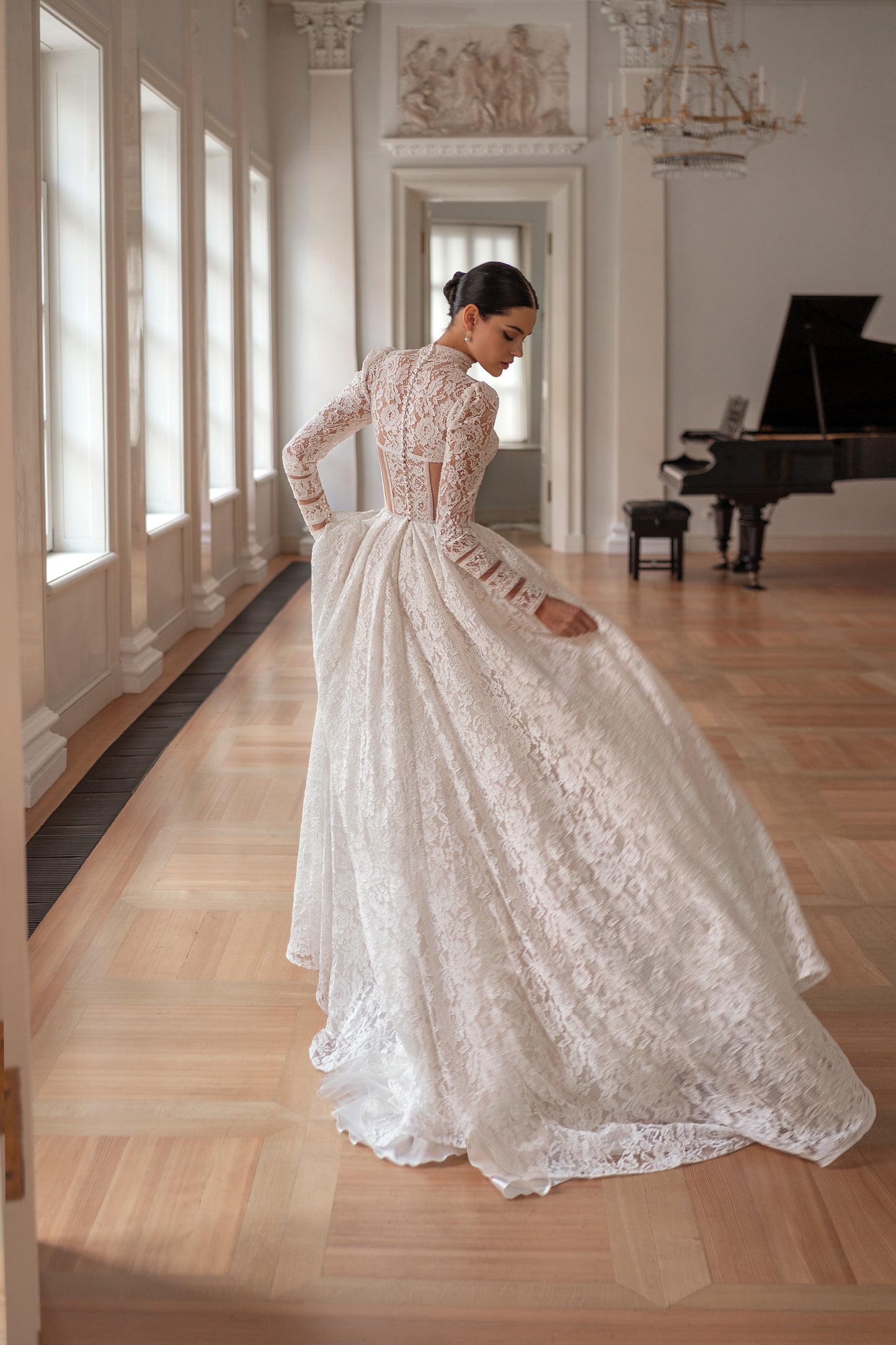 Princess wedding dress with chapel train and long sleeves.