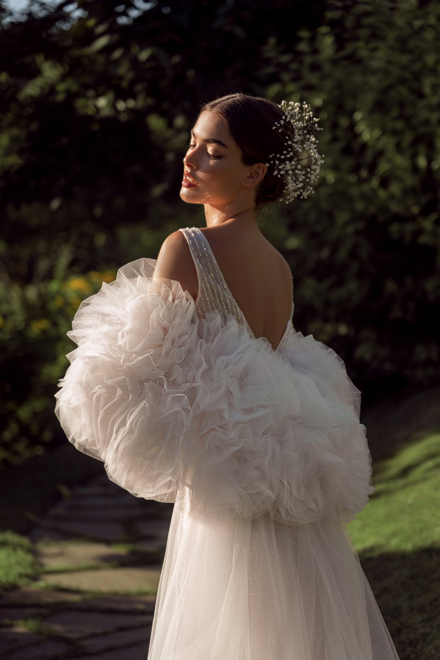 Sleeveless sheath wedding dress with tulle and sequin details