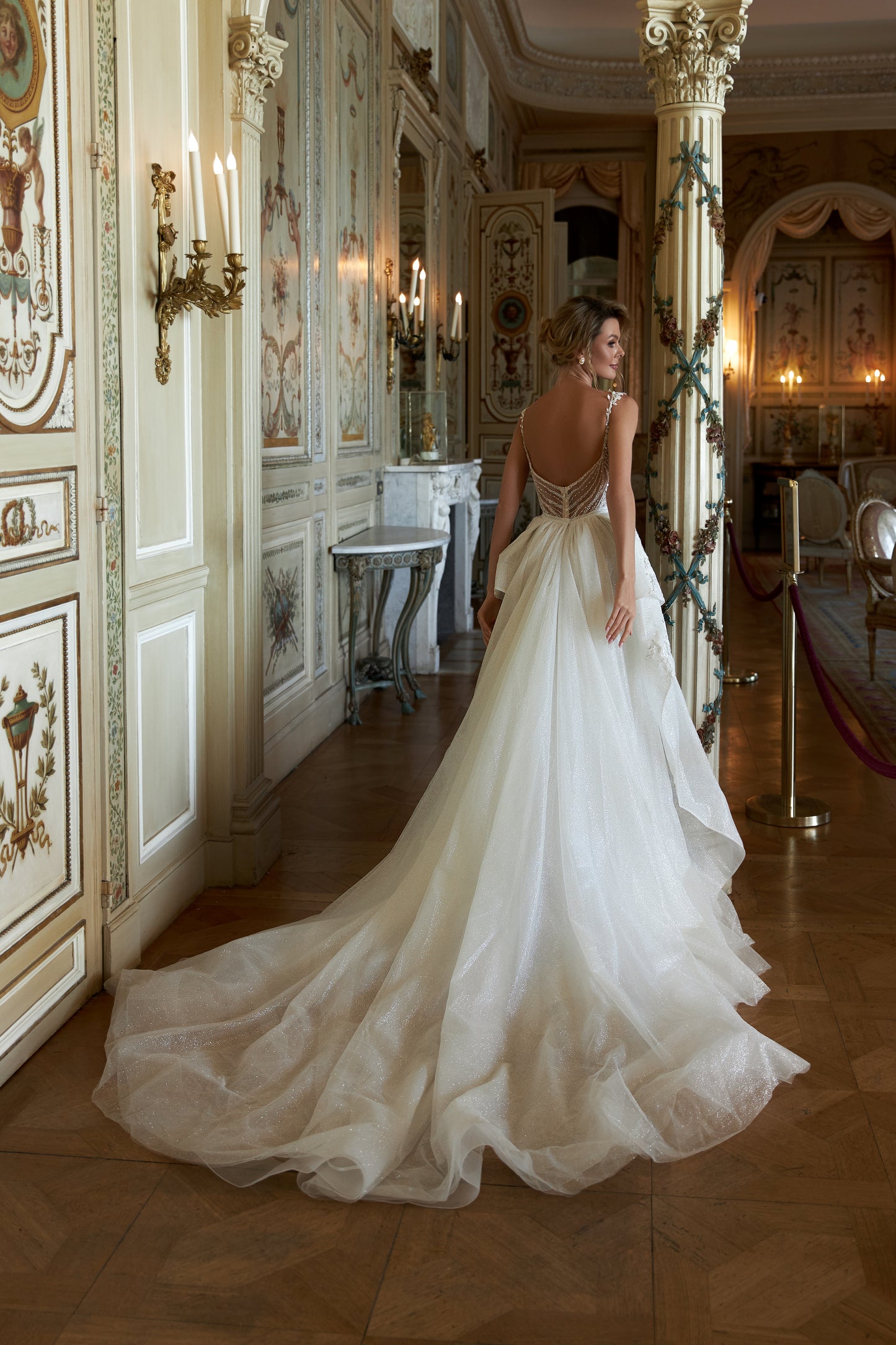 Fitted wedding dress with detachable chapel overskirt