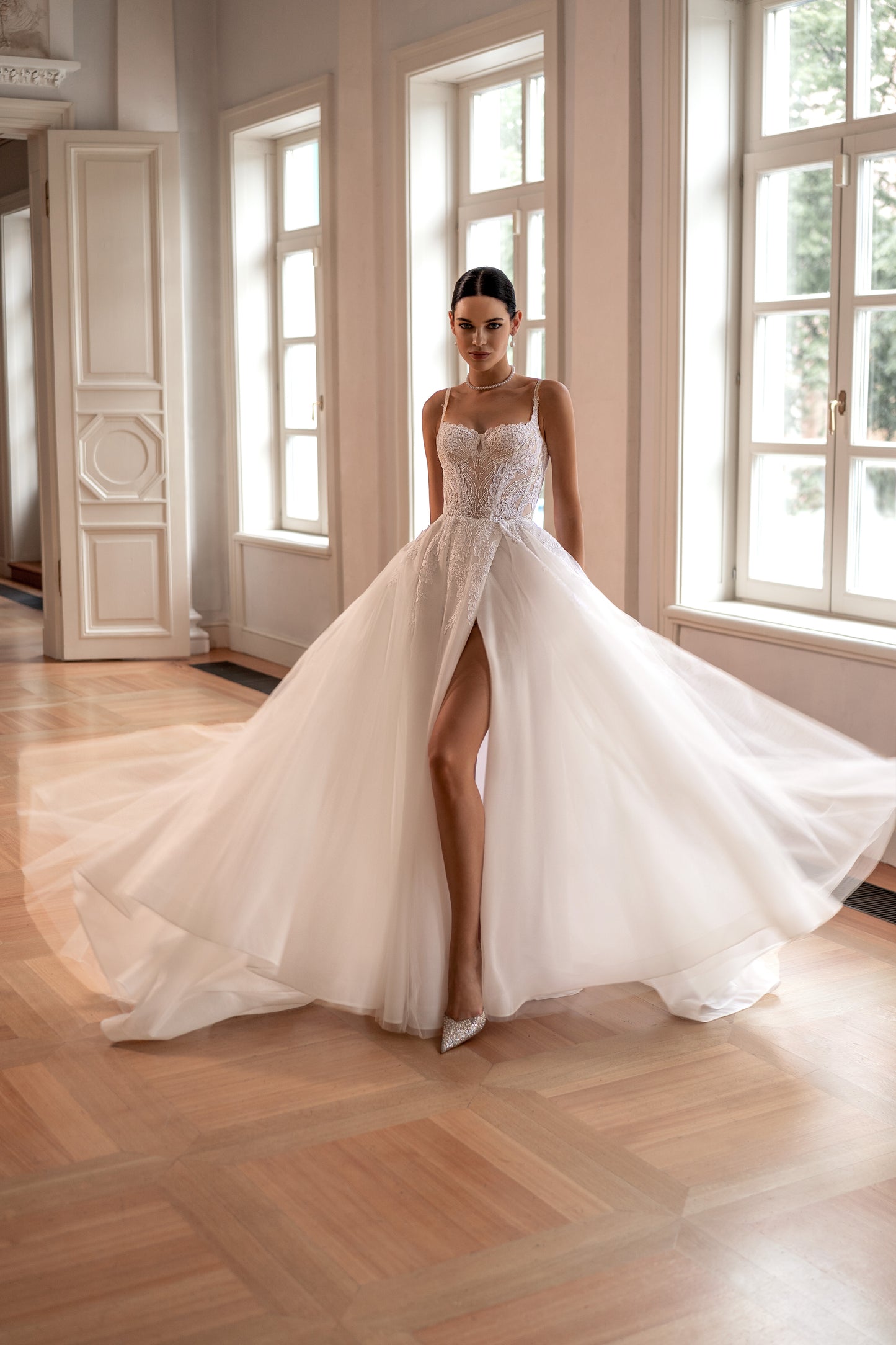 A-line wedding dress with spaghetti straps and boat neckline