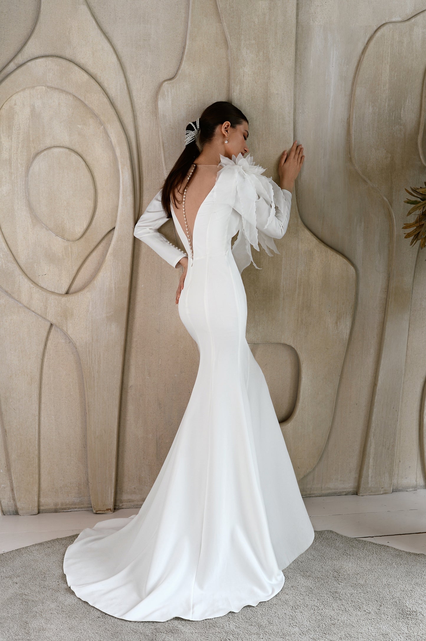 Minimalist mermaid wedding dress with long sleeves and 3D brooch