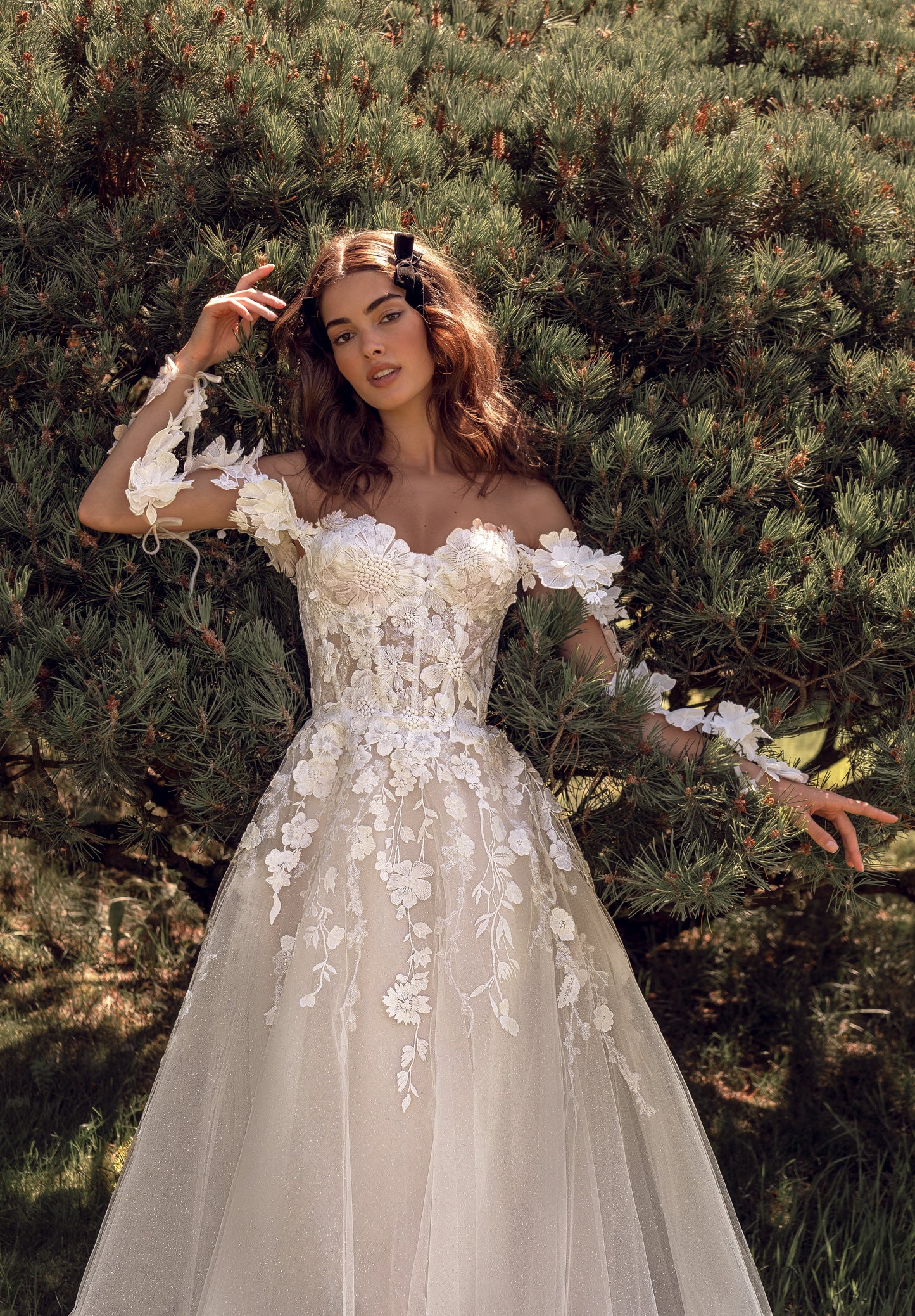 Romantic Off the shoulder Long illusion sleeves Sweetheart neckline Open back Lace-up closure A-line Court train Lace Tulle glitter Wedding dress