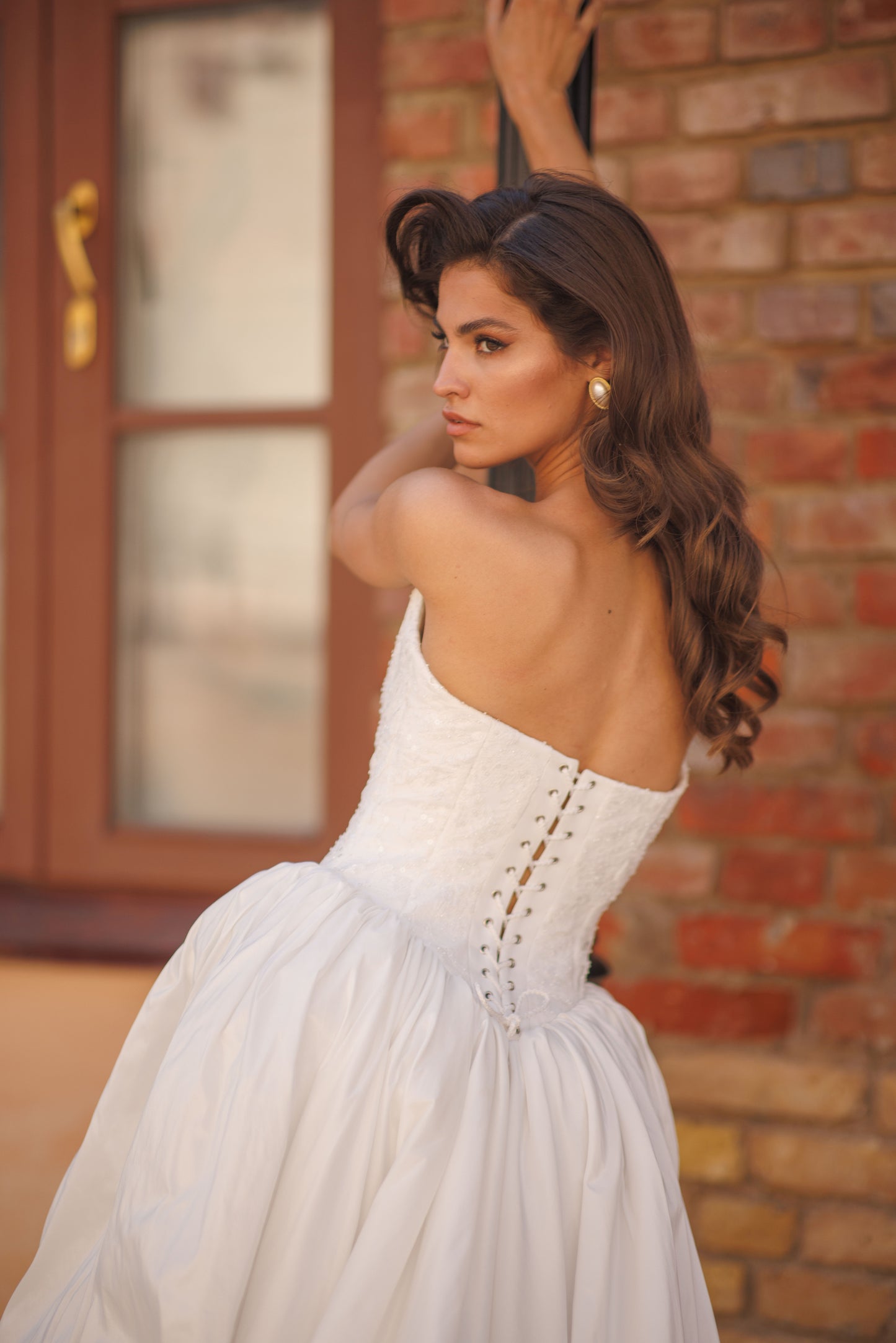 Princess wedding dress with chapel train and lace-up corset