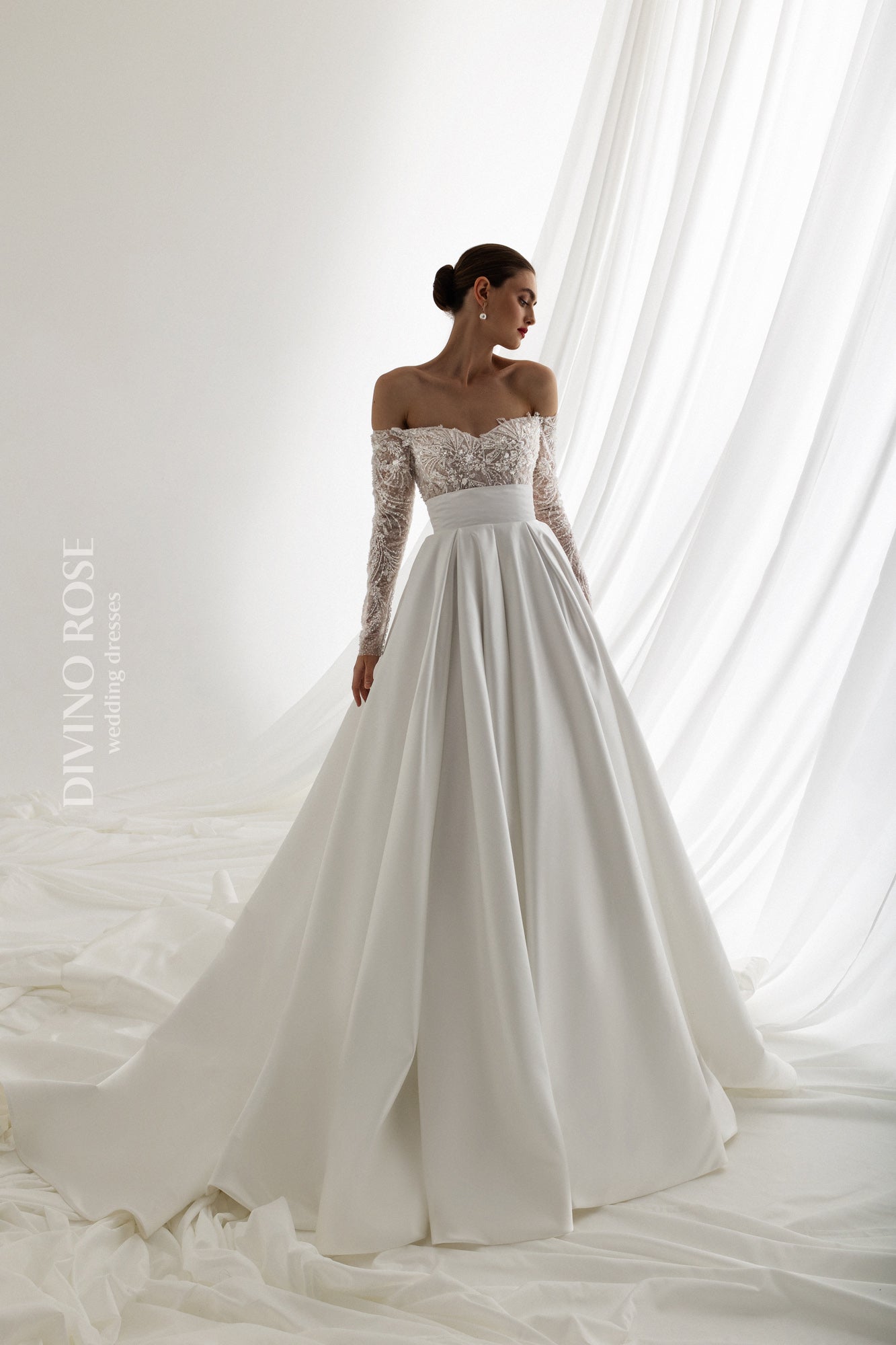 Off the shoulder satin wedding dress with chapel train