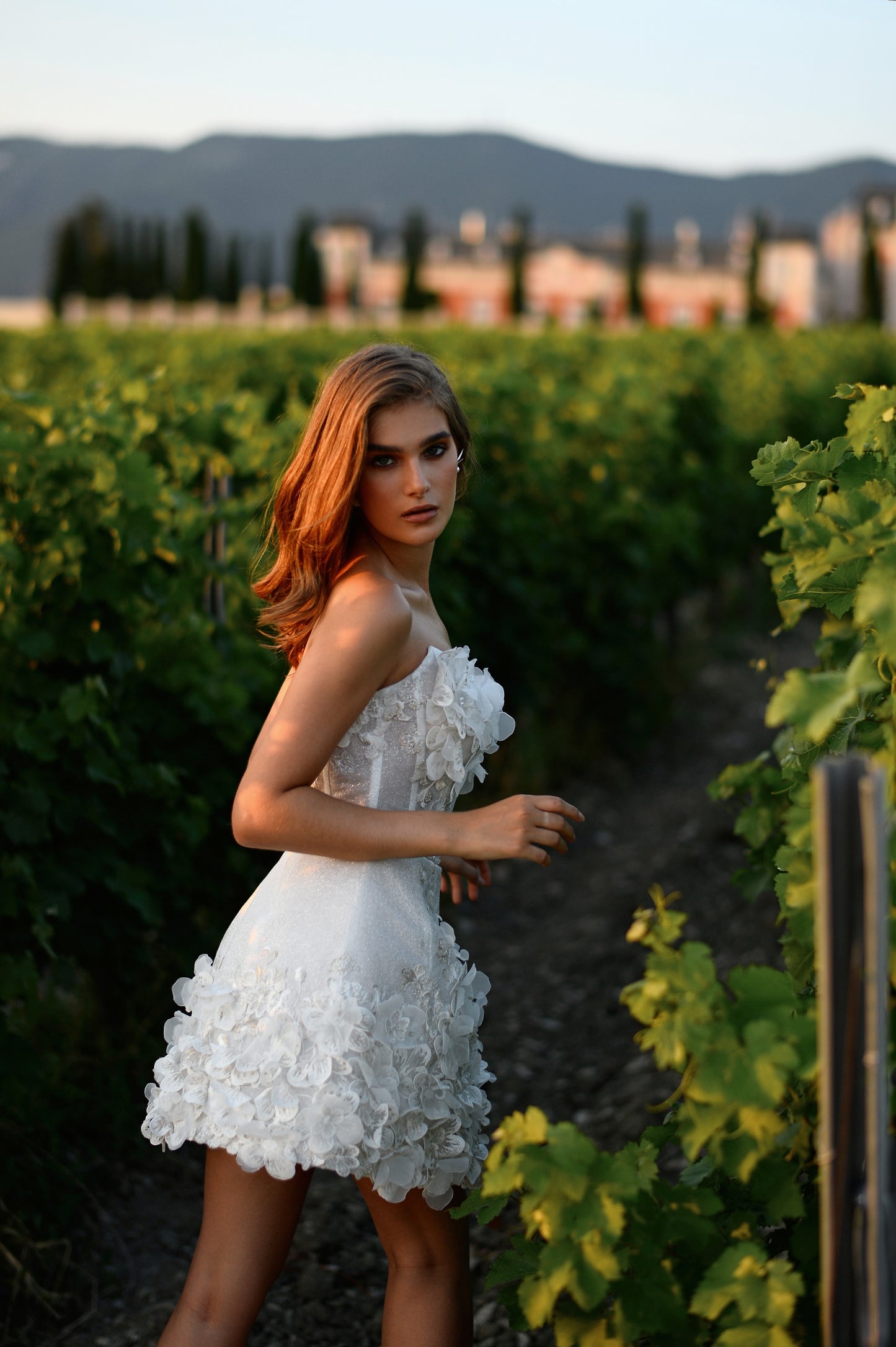 Mini sleeveless A-line wedding dress with 3D floral details