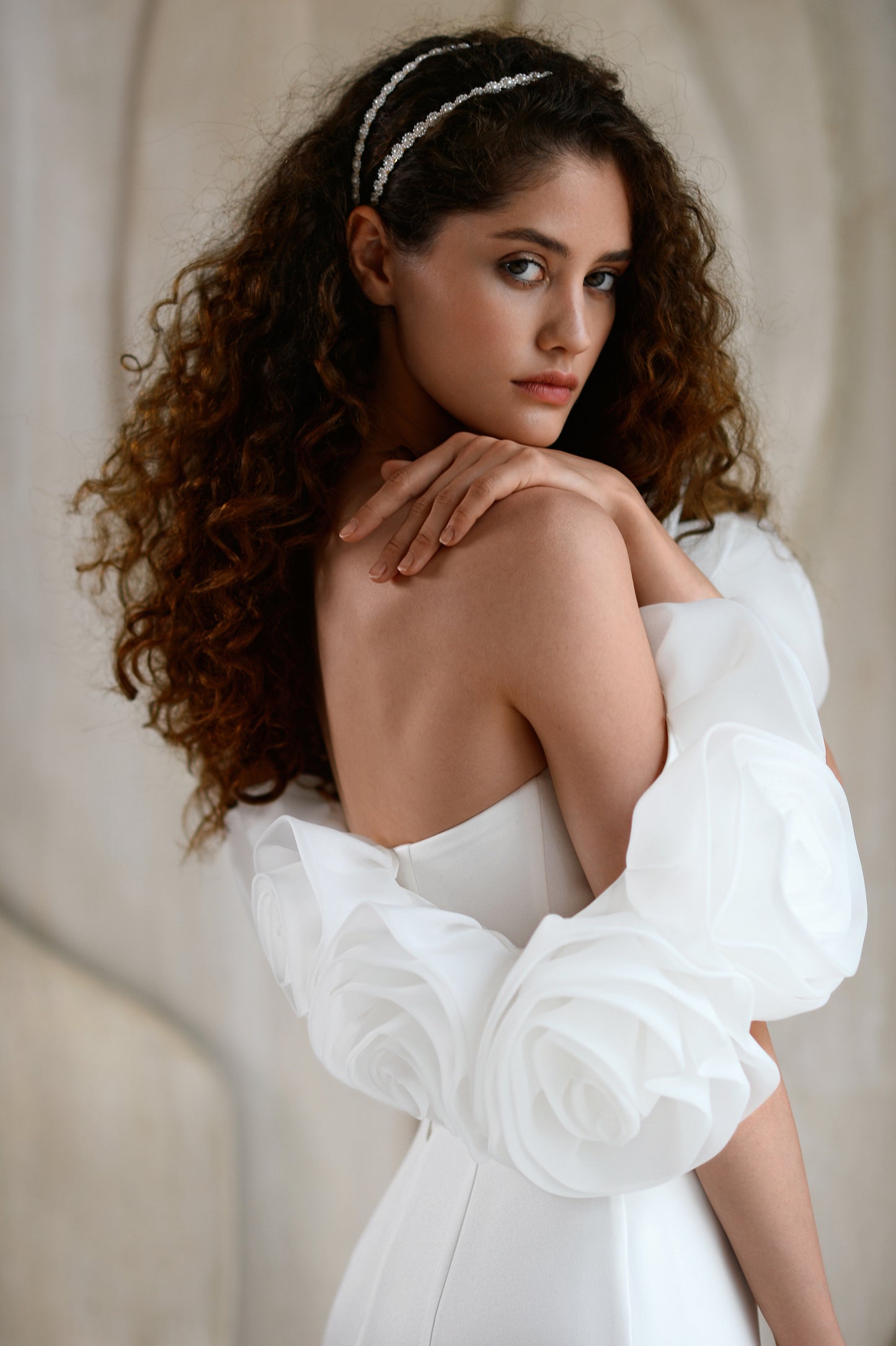 Minimalist mermaid wedding dress with boat neckline and sweep train