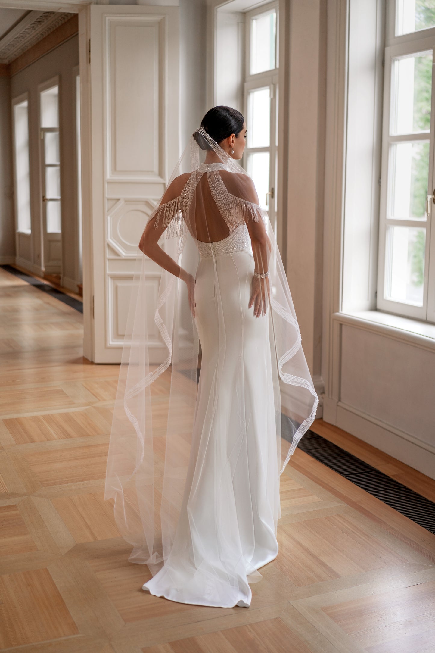 Mock neck sleeveless wedding dress with mermaid silhouette