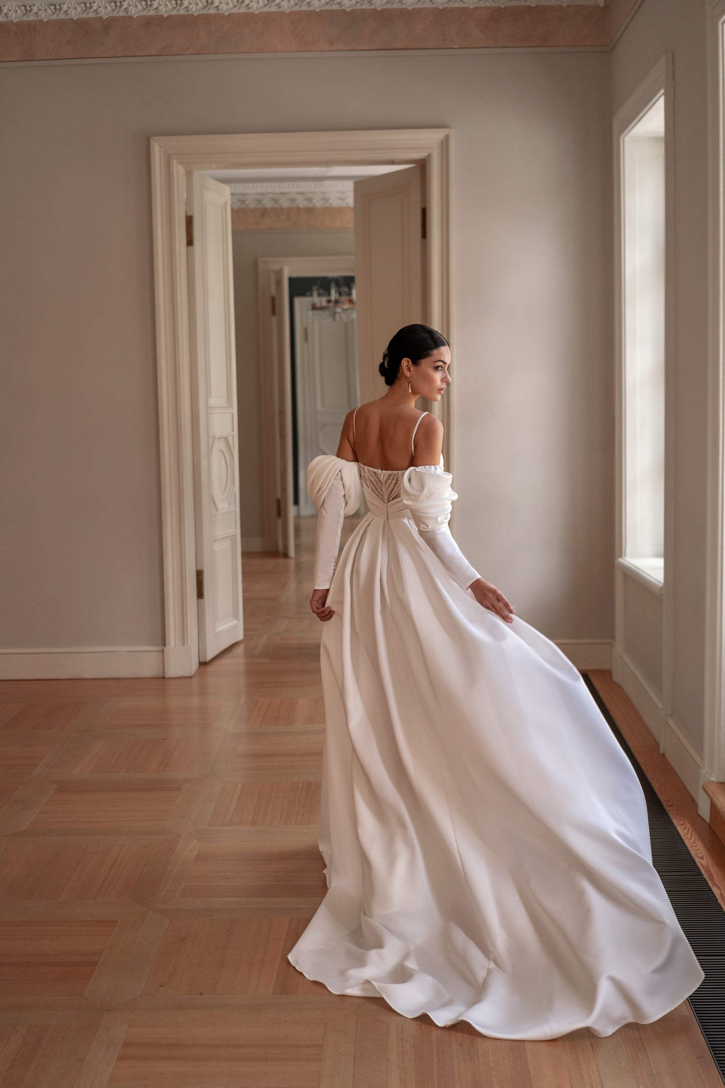 Minimalist wedding dress with boat neckline and removable sleeves