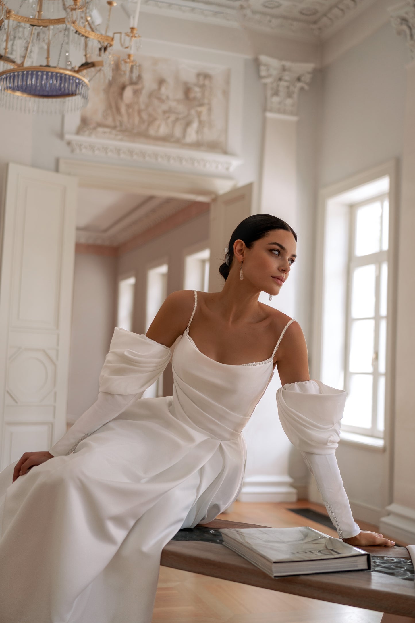 Minimalist wedding dress with boat neckline and removable sleeves