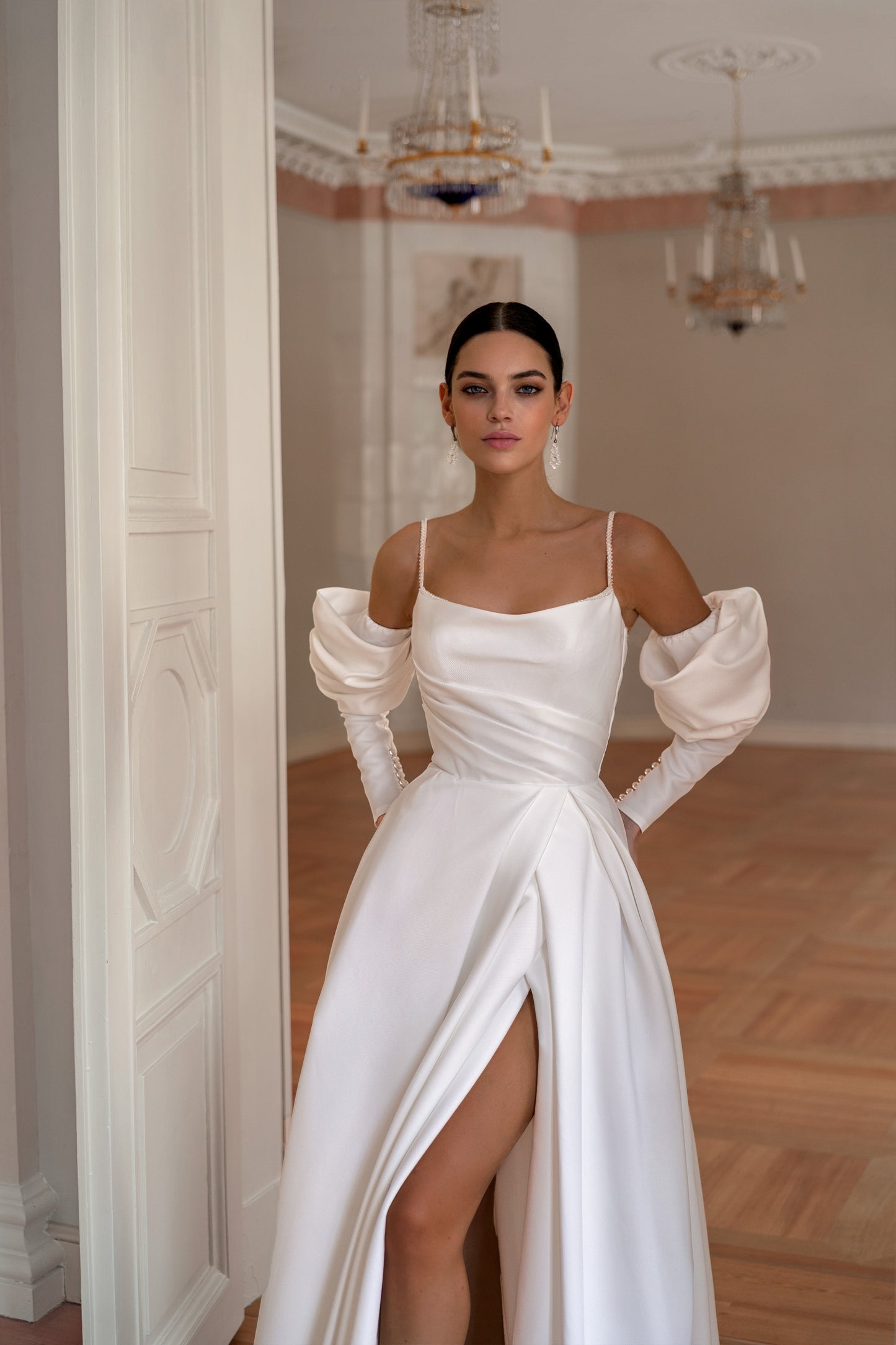 Minimalist wedding dress with boat neckline and removable sleeves