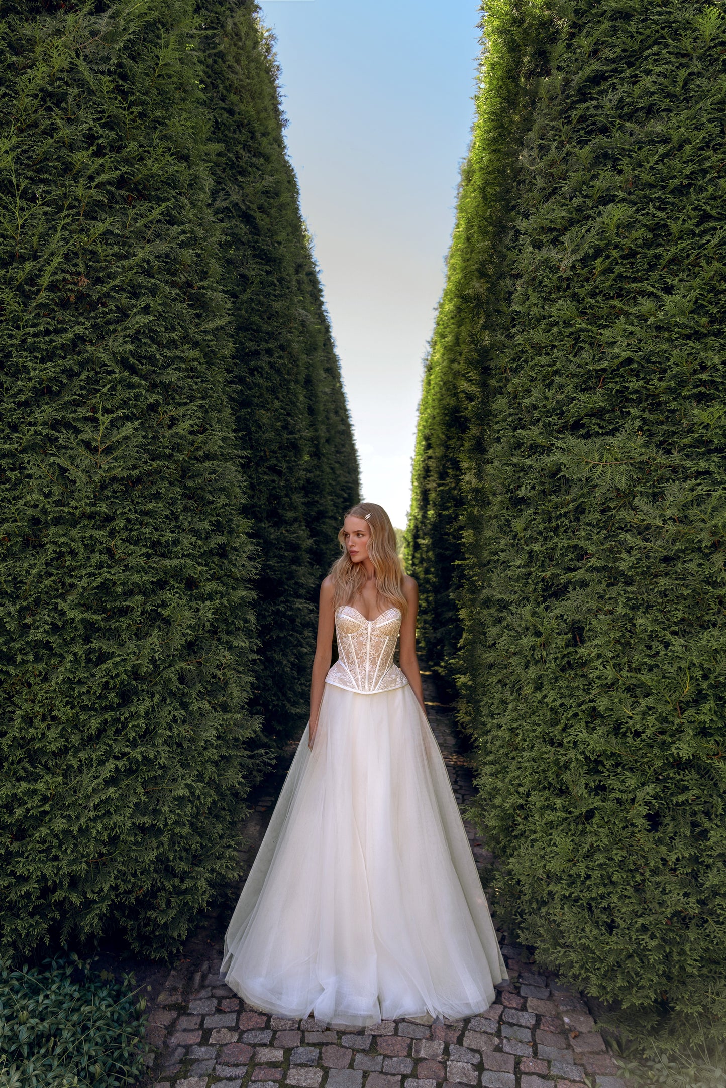 Sleeveless Sweetheart A-line wedding dress with chapel train