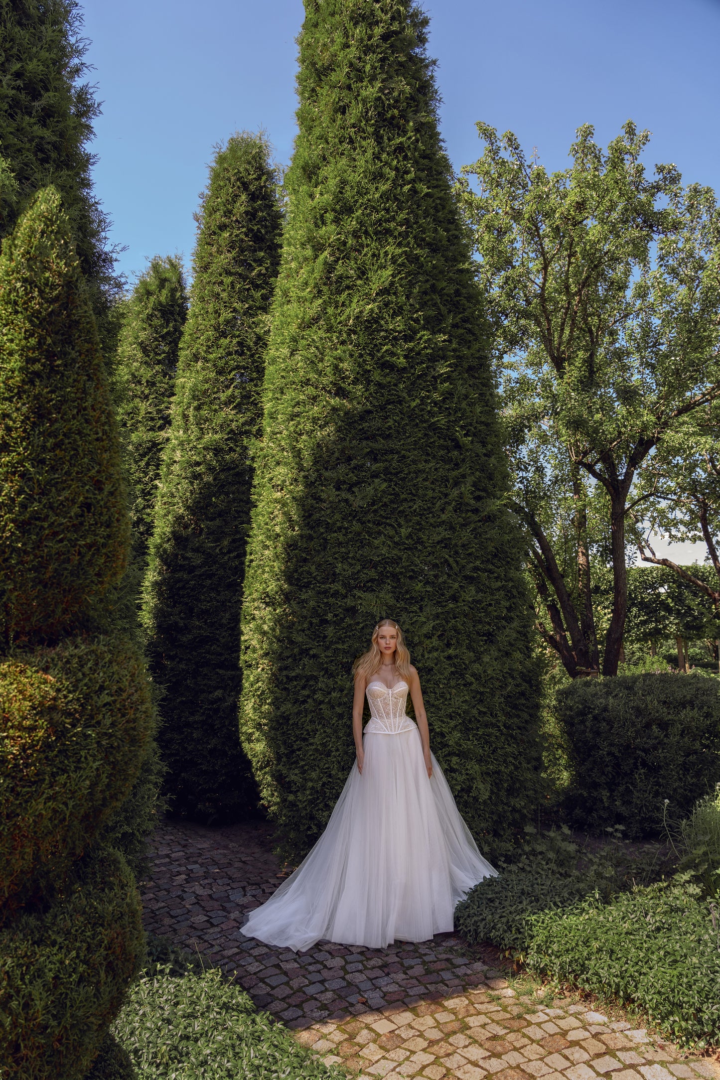 Sleeveless Sweetheart A-line wedding dress with chapel train