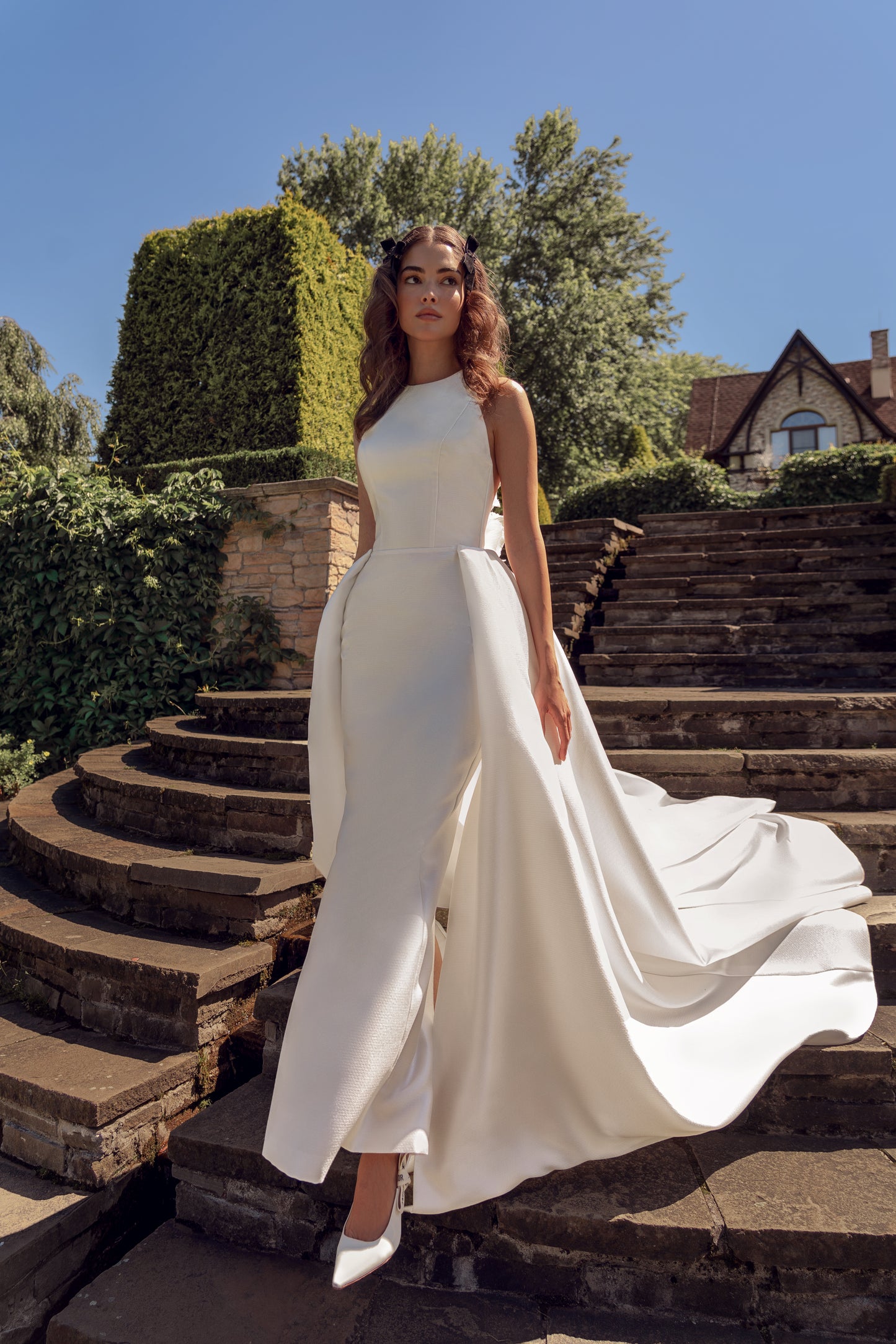 Jacquard mermaid wedding dress with 3D floral back details.