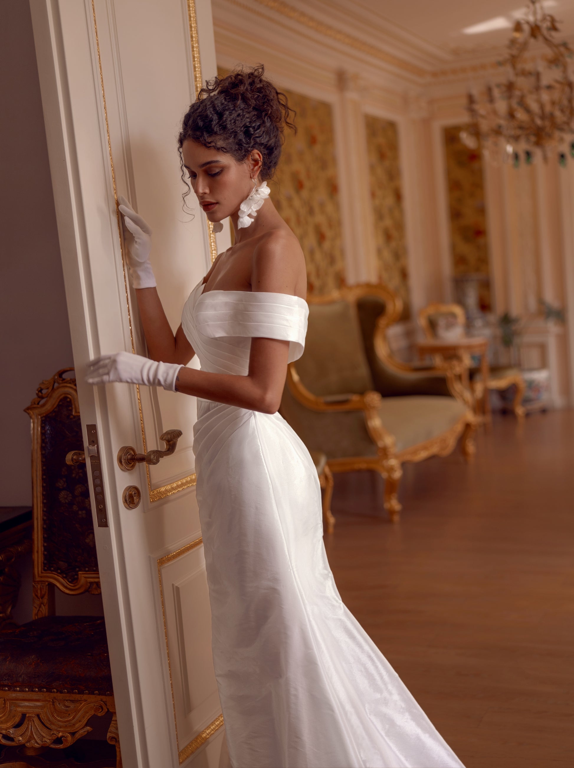 off-shoulder taffeta mermaid wedding dress with pleated bodice and detachable ball gown overskirt